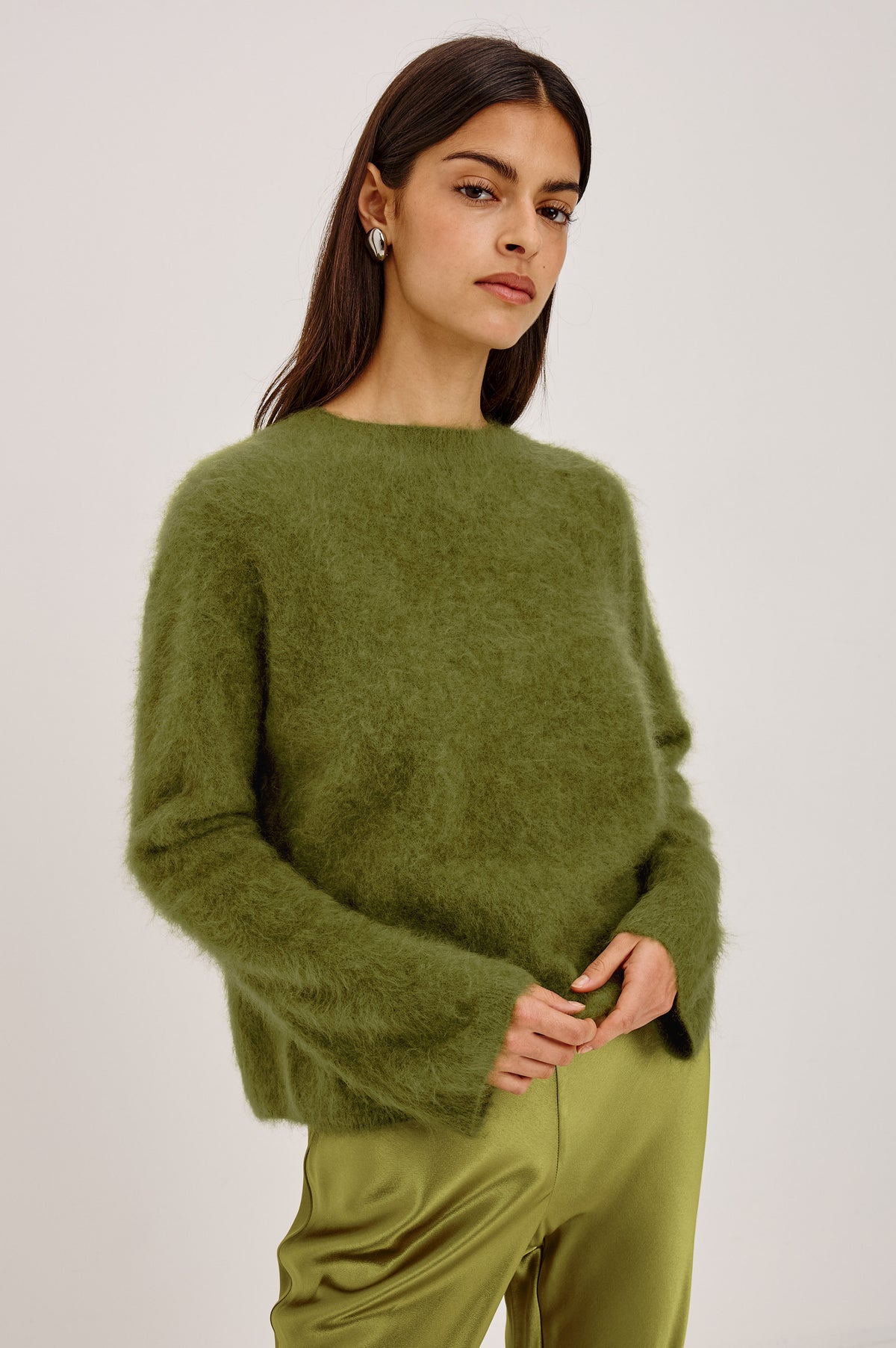 Joel Sweater in Brushed Wool With Oversized Boxy Relaxed Fit, Drop Shoulders, and Mock Neckline in Celery Colorway - Upper Body Front View Featured on Model.