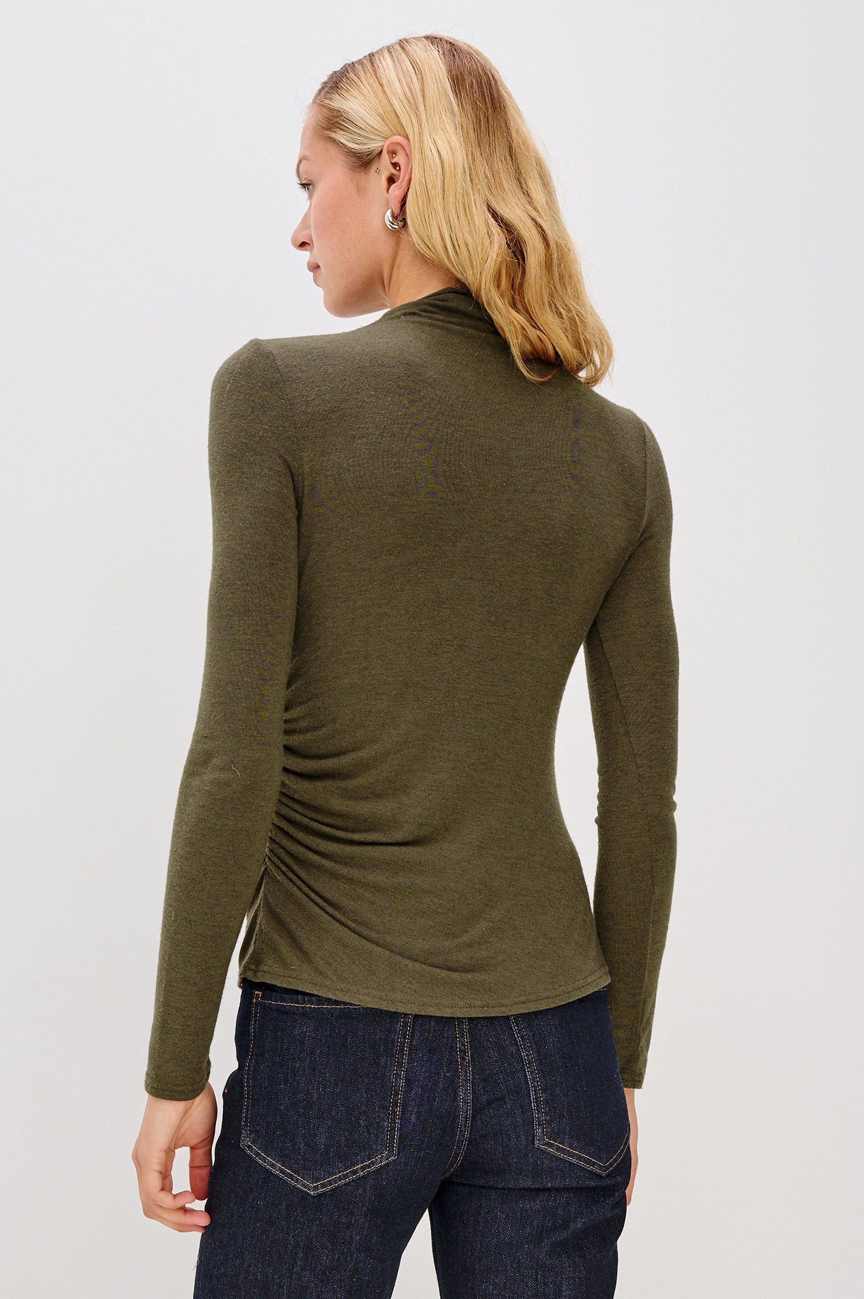 Joelle Long Sleeve Top with An Asymmetrical Mock Neck and Shirring on the Right Shoulder in Heather Olive Colorway - Back View Featured on Model
