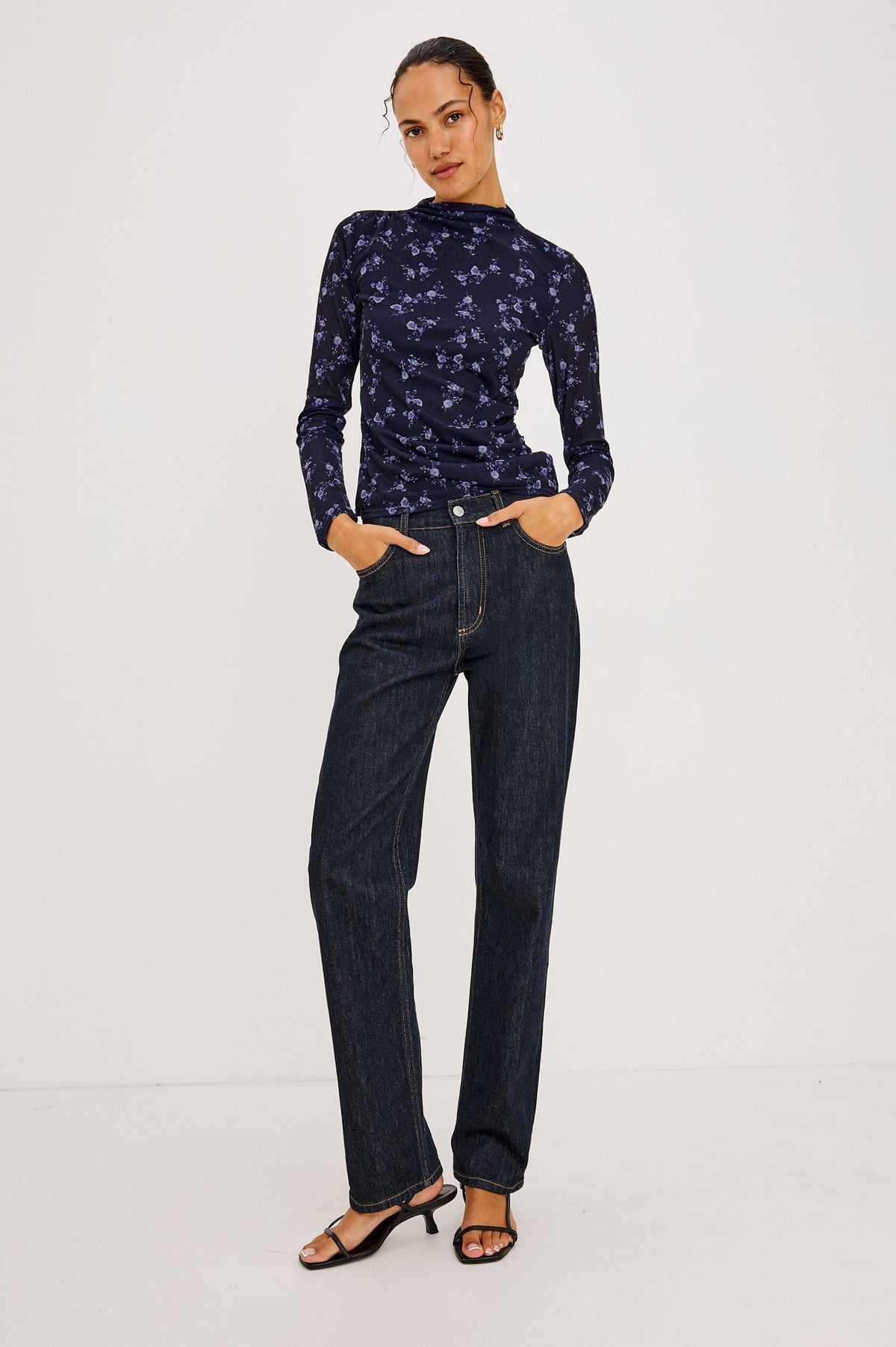 Joelle Top in Floral Print Mesh With Mock Neck Collar, Gathered Shoulders, and Long Sleeves in Navy Romantic Floral Colorway - Full Body Front View Featured on Model.
