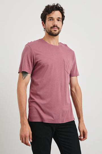 Johnny Short Sleeve T-Shirt with a Crew Neck, Chest Patch Pocket and Small Slits at the Side Hems in Cranberry Colorway - Front View Featured on Model