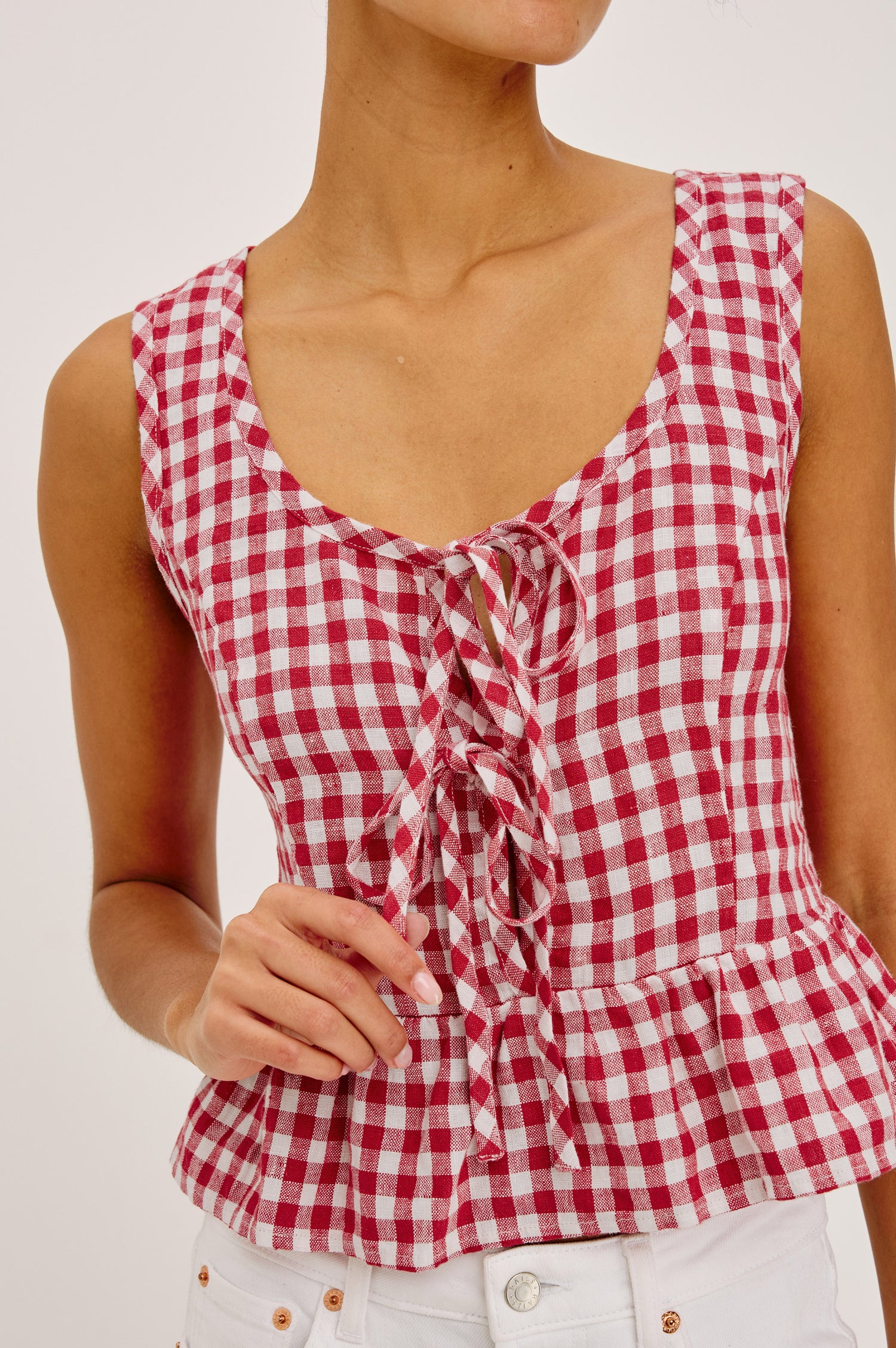 Jonah Crop Top in Linen With Plunging Front With Self-Ties, Side Seam Zipper, Front Princess Seams, and Peplum Hem in Picnic Check Colorway - Upper Body Front View Featured on Model