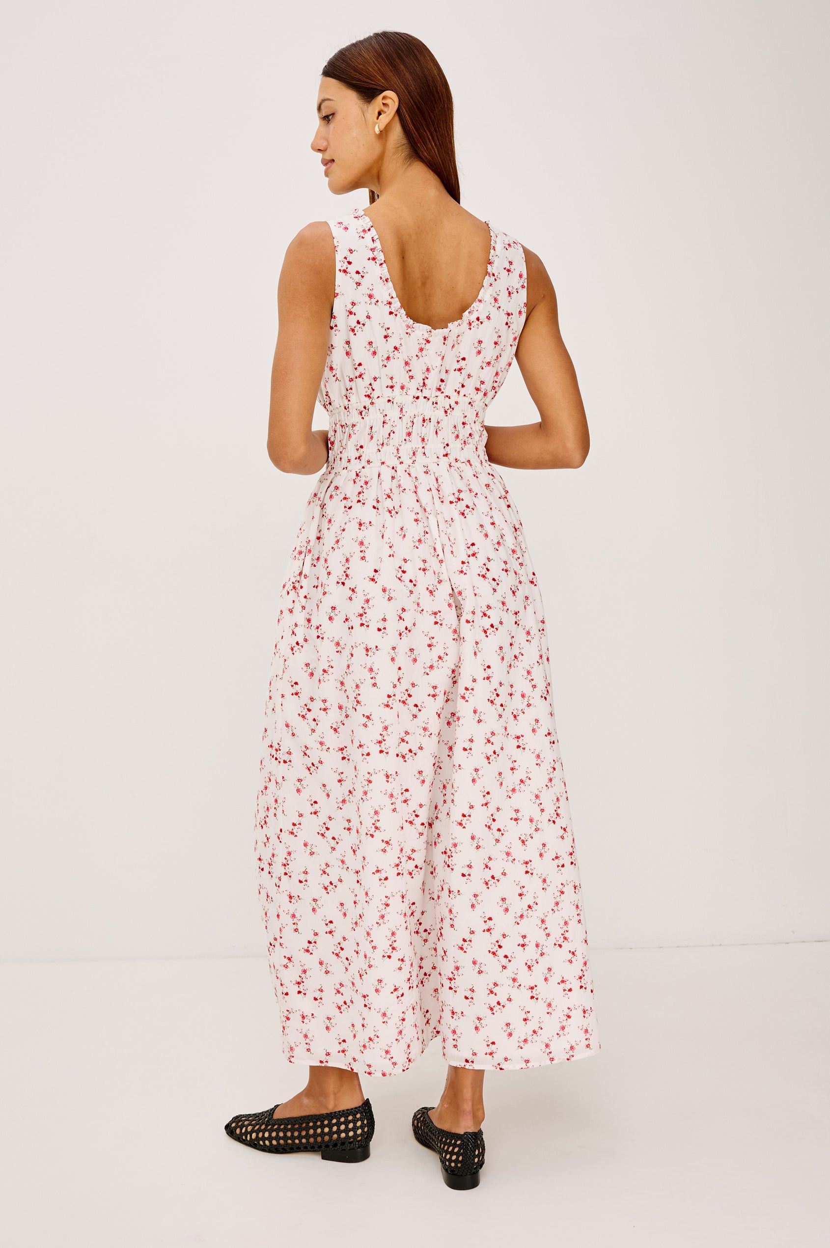 Jordie Maxi Dress in Cotton Voile With A-Line Silhouette, Rounded Square Neckline, Ruffle Trim, Center-Front Bust Cutrout With Self-Ties, Smocked Waist, Side Pockets, and Fully Lined Skirt in Rouge Romantic Colorway - Full Body Back View Featured on Model
