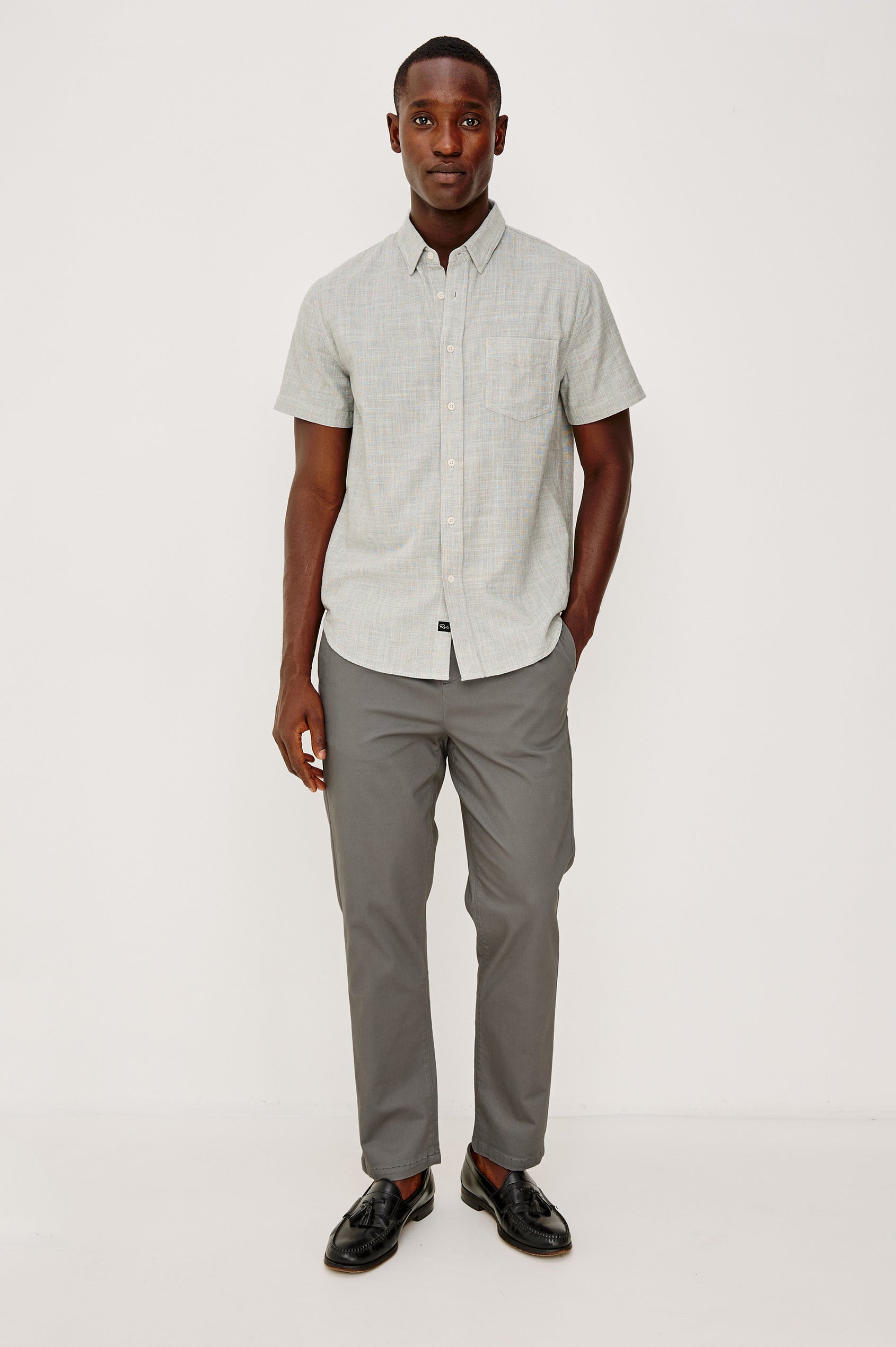 Julian Pant in Sueded Cotton Stretch with an Elastic Waist, Side Pockets, and Two Back Welt Pockets in Concrete Colorway - Full Body Front View Featured on Model