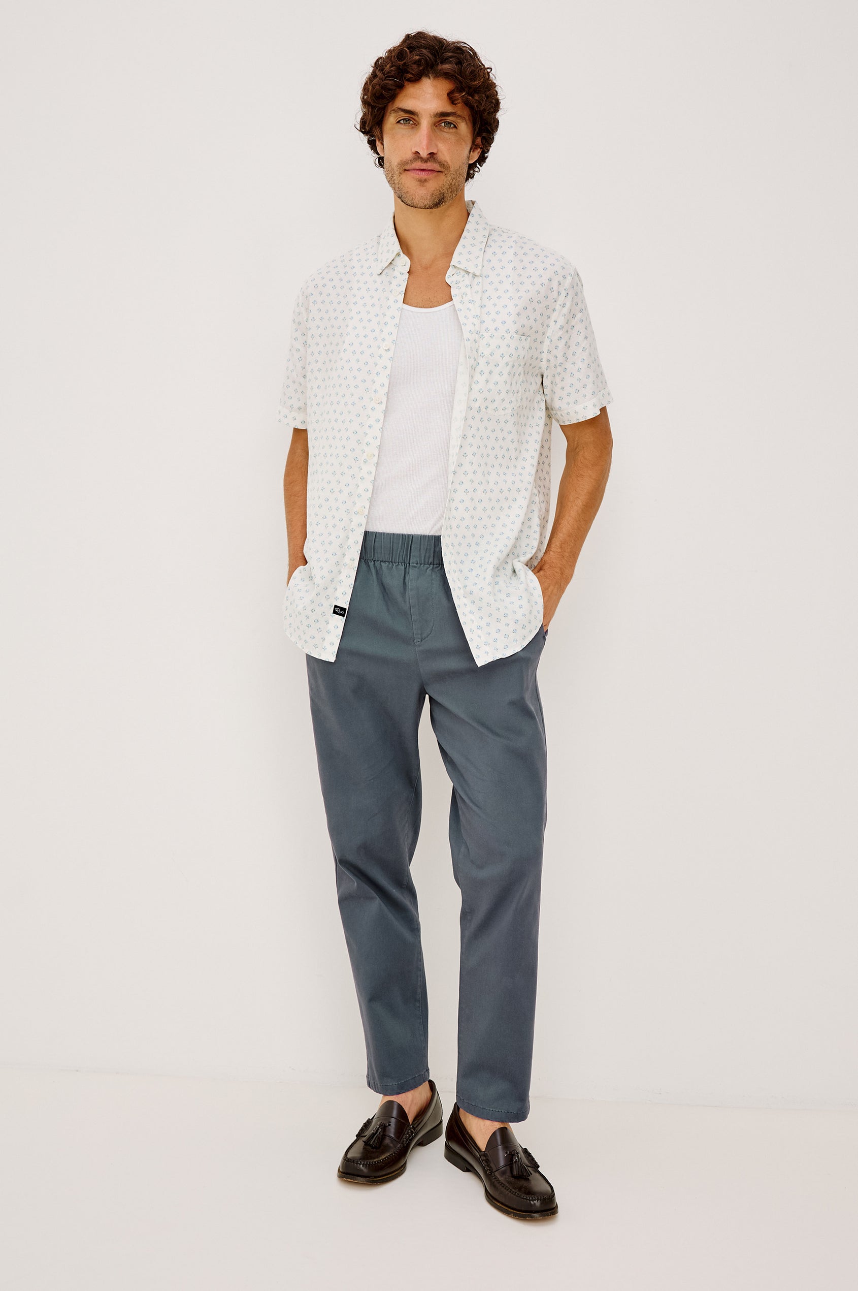 Julian Pant in Cotton Blend With Relaxed Straight Fit, Elastic Waist, and Back Welt Pockets Faded Blue Colorway - Full Body Front View Featured on Model