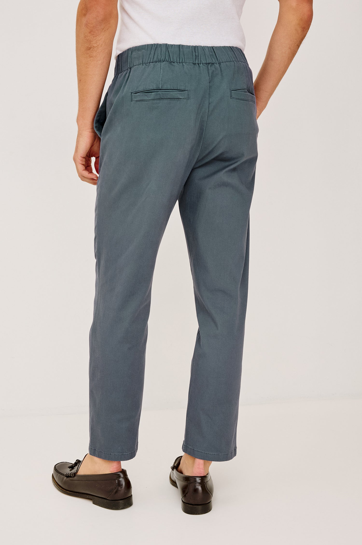 Julian Pant in Cotton Blend With Relaxed Straight Fit, Elastic Waist, and Back Welt Pockets Faded Blue Colorway - Lower Body Back View Featured on Model