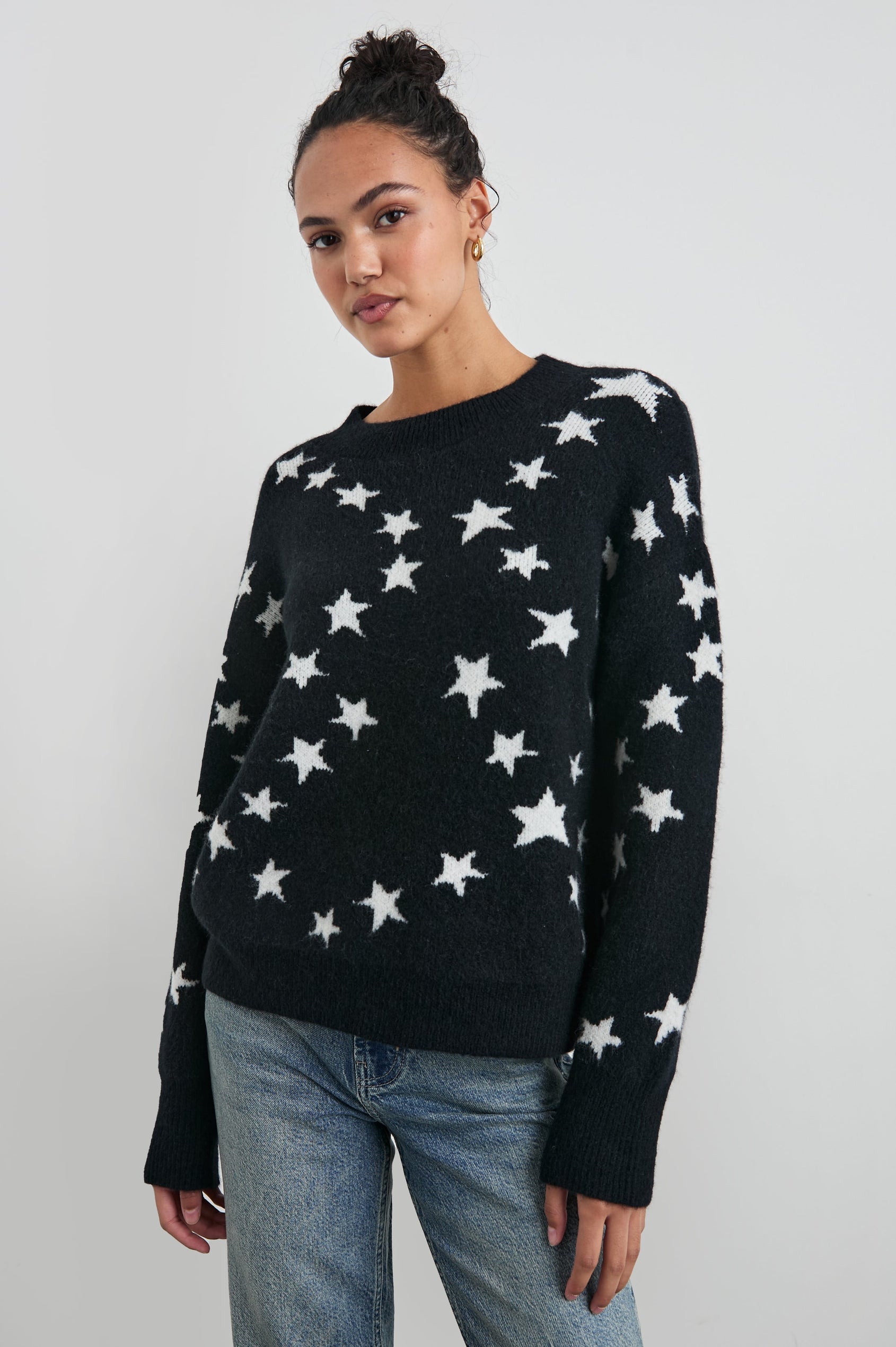 Kana Long-Sleeve Sweater with a Crew Neck in Star Chain Colorway, White Stars on Black - Front View Featured on Model 