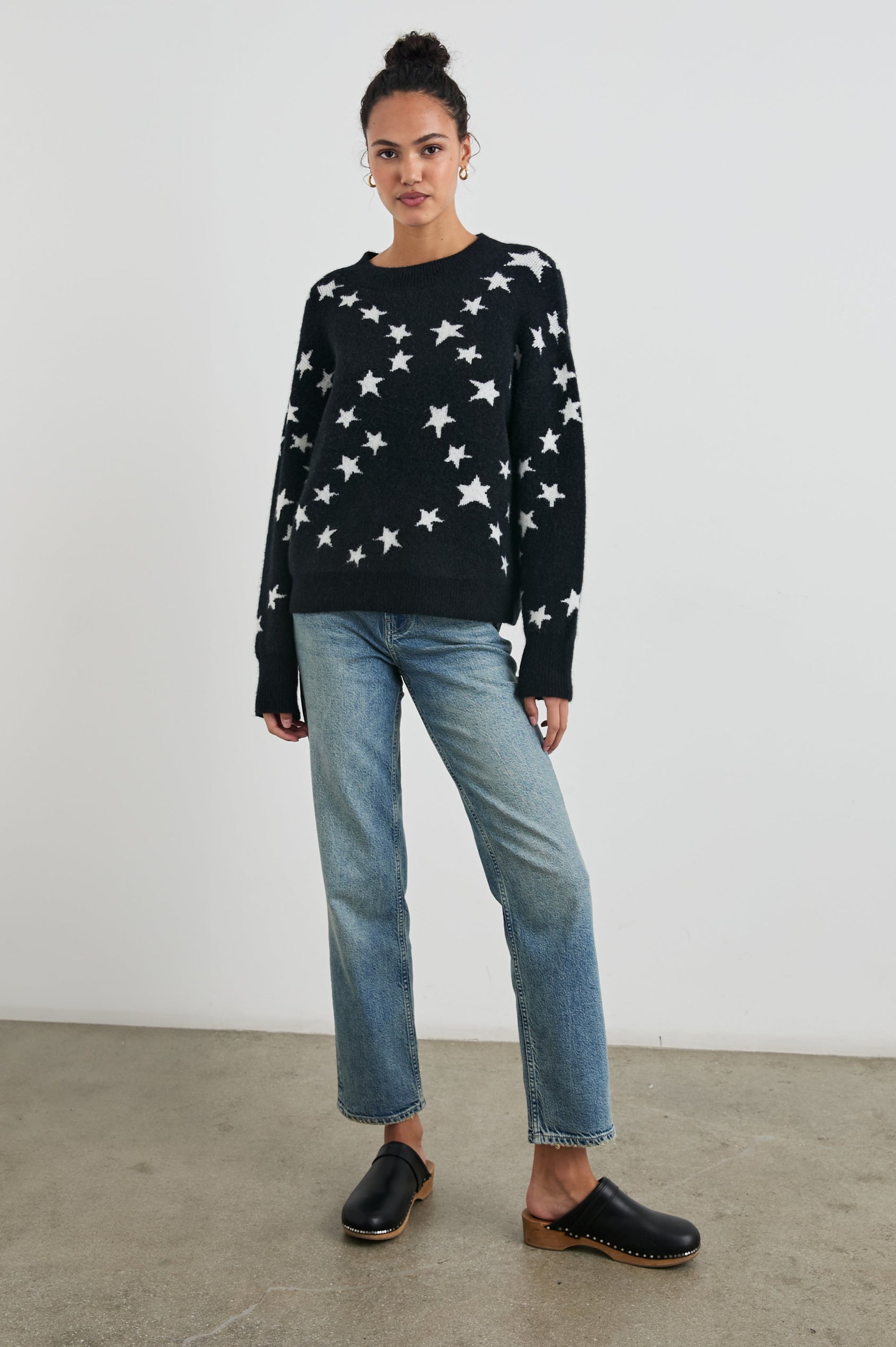 Kana Long-Sleeve Sweater with a Crew Neck in Star Chain Colorway, White Stars on Black - Front Full Body View Featured on Model 