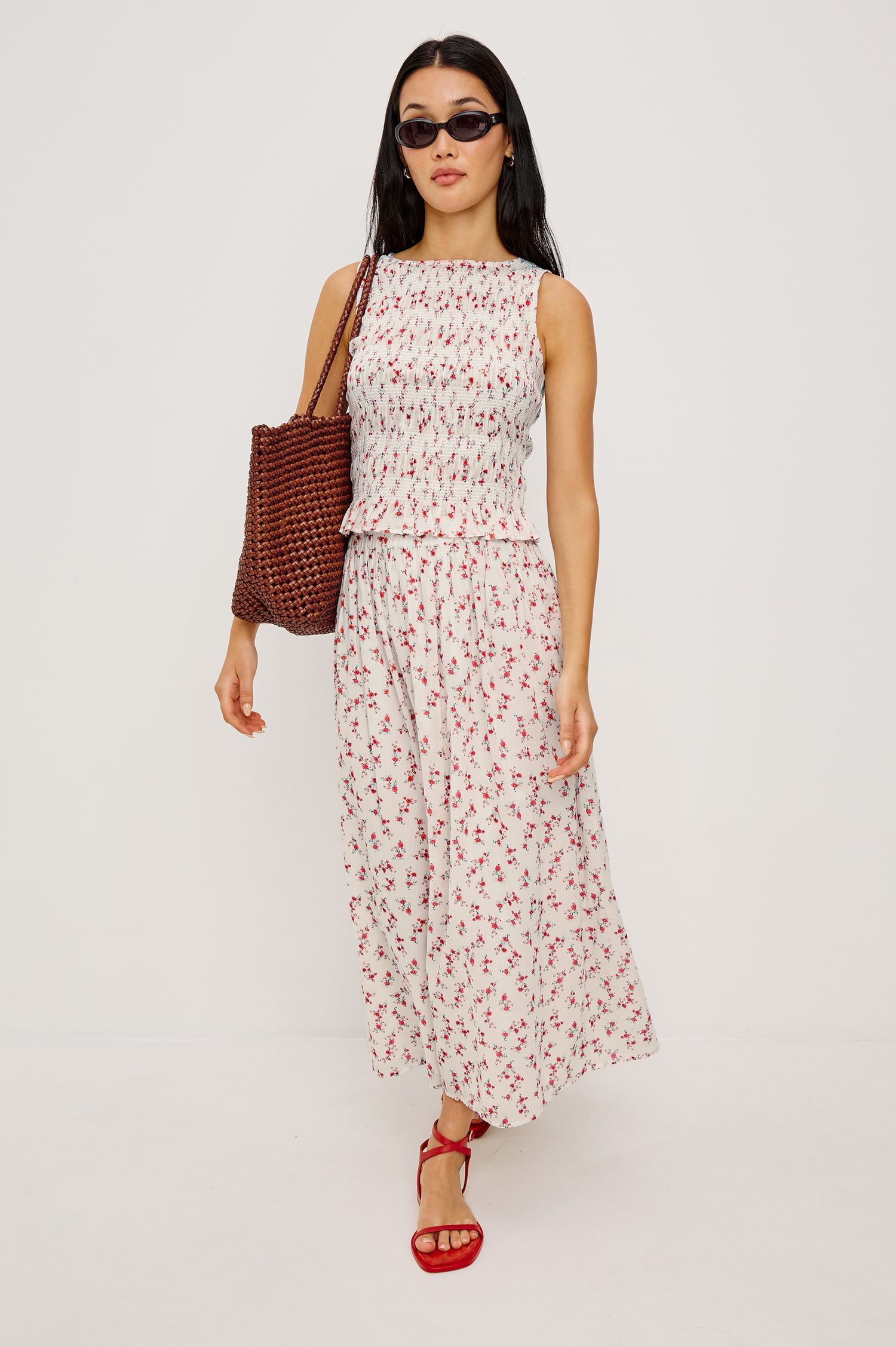 Kane Sleeveless Fitted Top in Cotton With Diamond Smocking All Over High Boat Neckline and Flared Ruffle Hem in Rouge Romantic Colorway - Full Body Front View Featured on Model