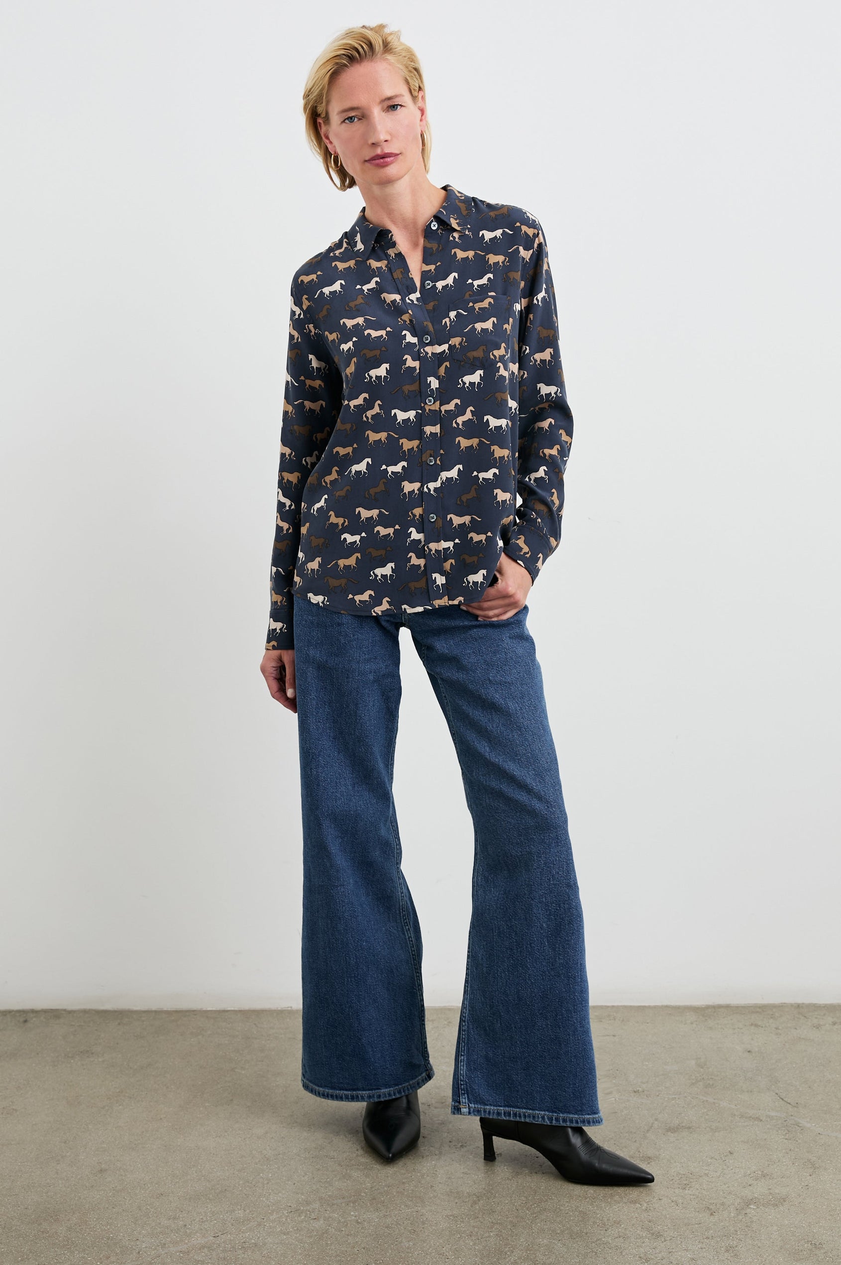 Kate Long Sleeve Button up with a Chest Patch Pocket in Horses Colorway, Horses in browns and white on Navy - Front Full Body View Featured on Model