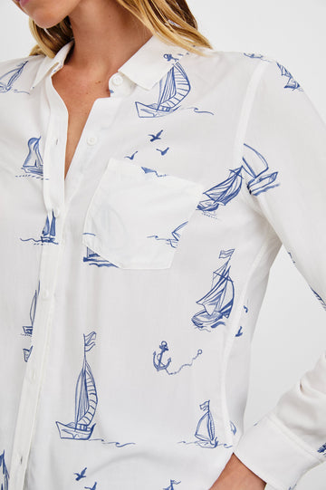 Kathryn Long-Sleeve Button up with a Chest Patch Pocket in Sailboats Colorway, blue sailboats on ivory - Front View Featured on Model