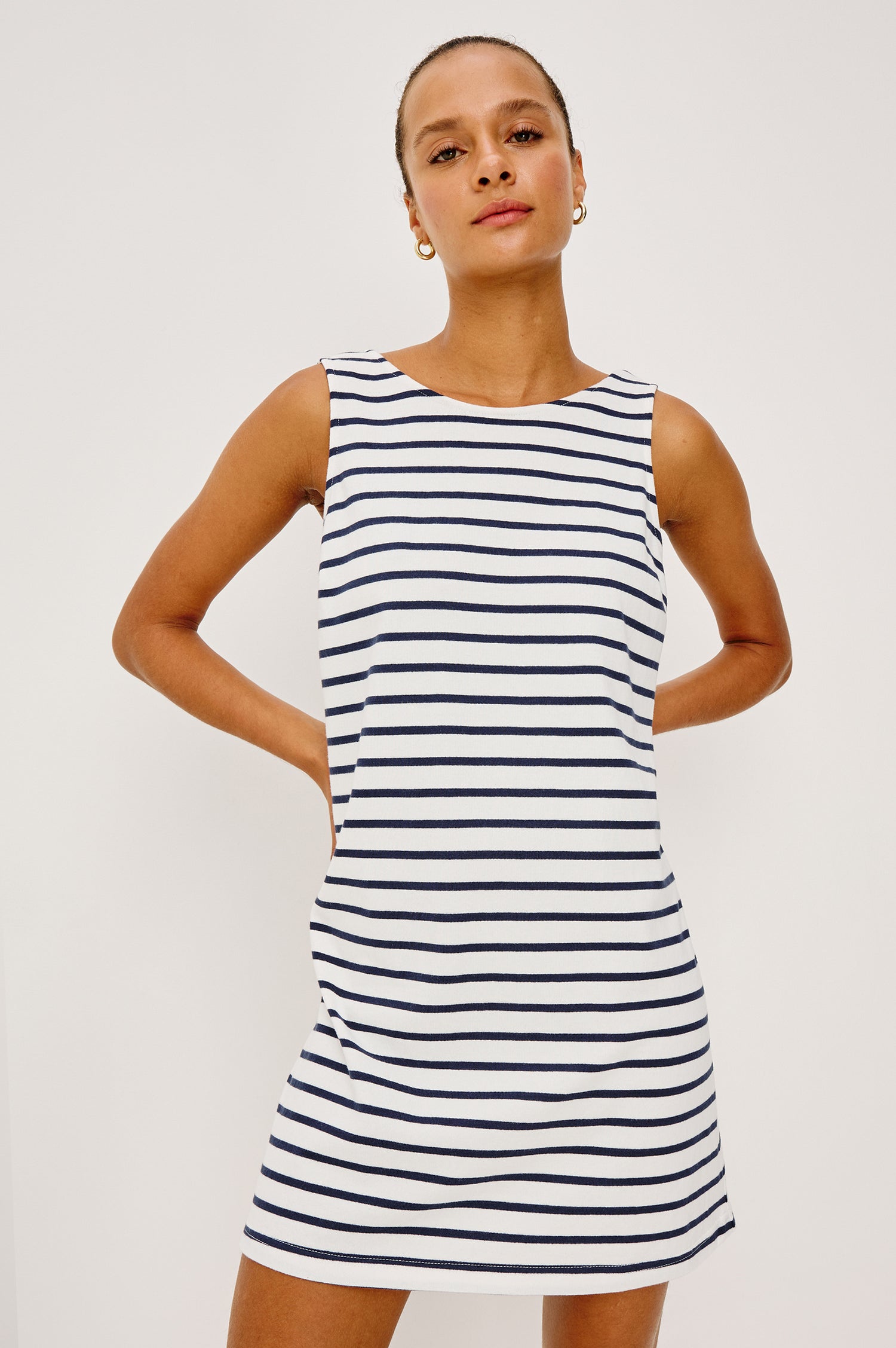 Kaylee Mini Dress in Cotton Jersey With Boat Neckline, A-Line Silhouette, and Scoop Back in Ivory Navy Stripe Colorway - Upper Body Front View Featured on Model
