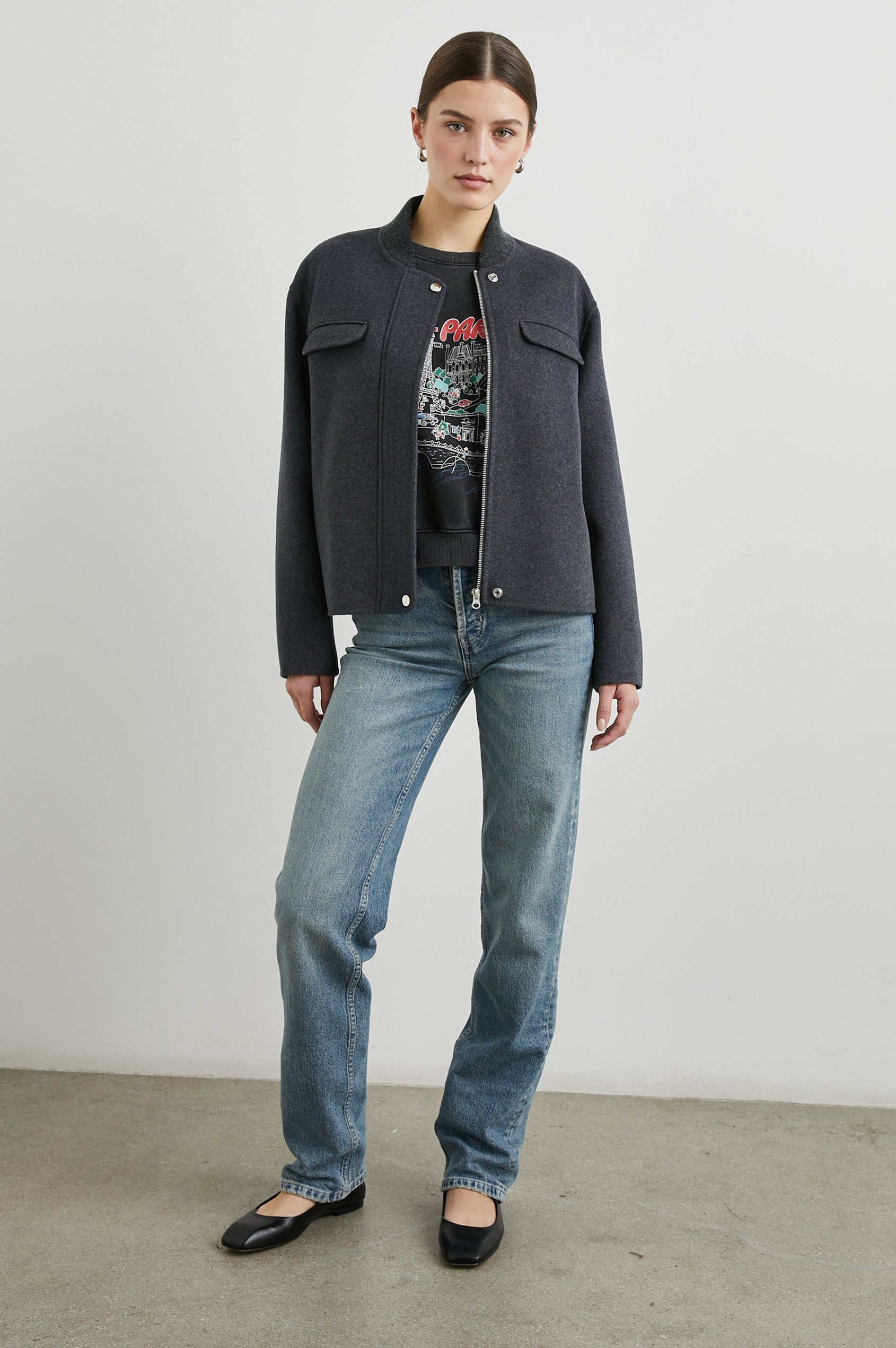 Kinsley Jacket with Zipper and Snap Closure, Two Chest Welt Flap Pockets and two Front Pockets in Charcoal Colorway - Front Full Body View Featured on Model