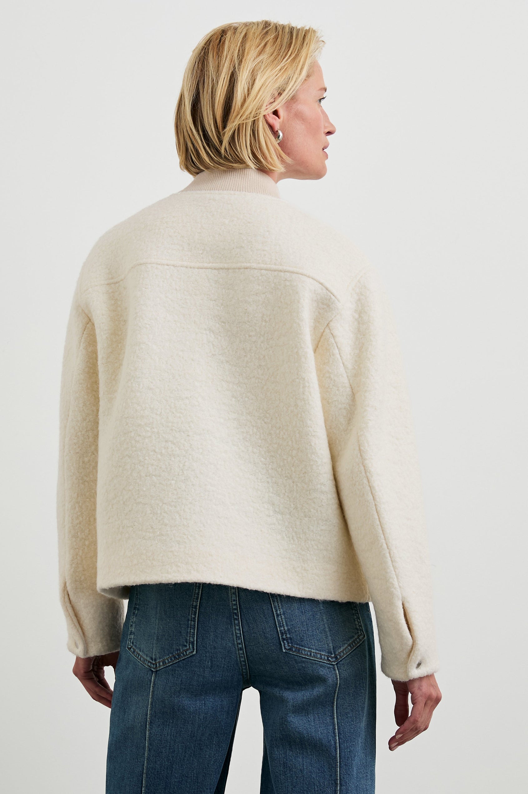Kinsley Jacket with Zipper and Snap Closure, Two Chest Welt Flap Pockets and two Front Pockets in Ivory Colorway - Back View Featured on Model