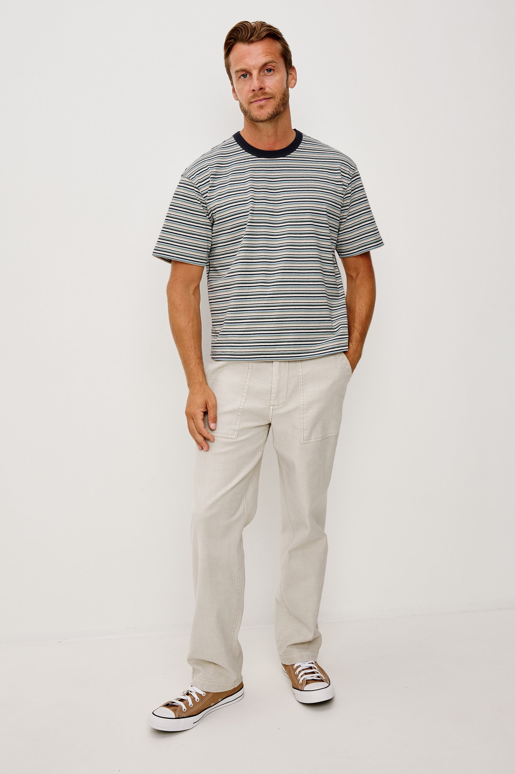 Kip T-Shirt in Relaxed Boxy Fit in Yarn-Dyed Jersey, Contrast Crew Neckline, and Short Sleeves in Azul Stripe Colorway - Full Body Front View Featured on Model