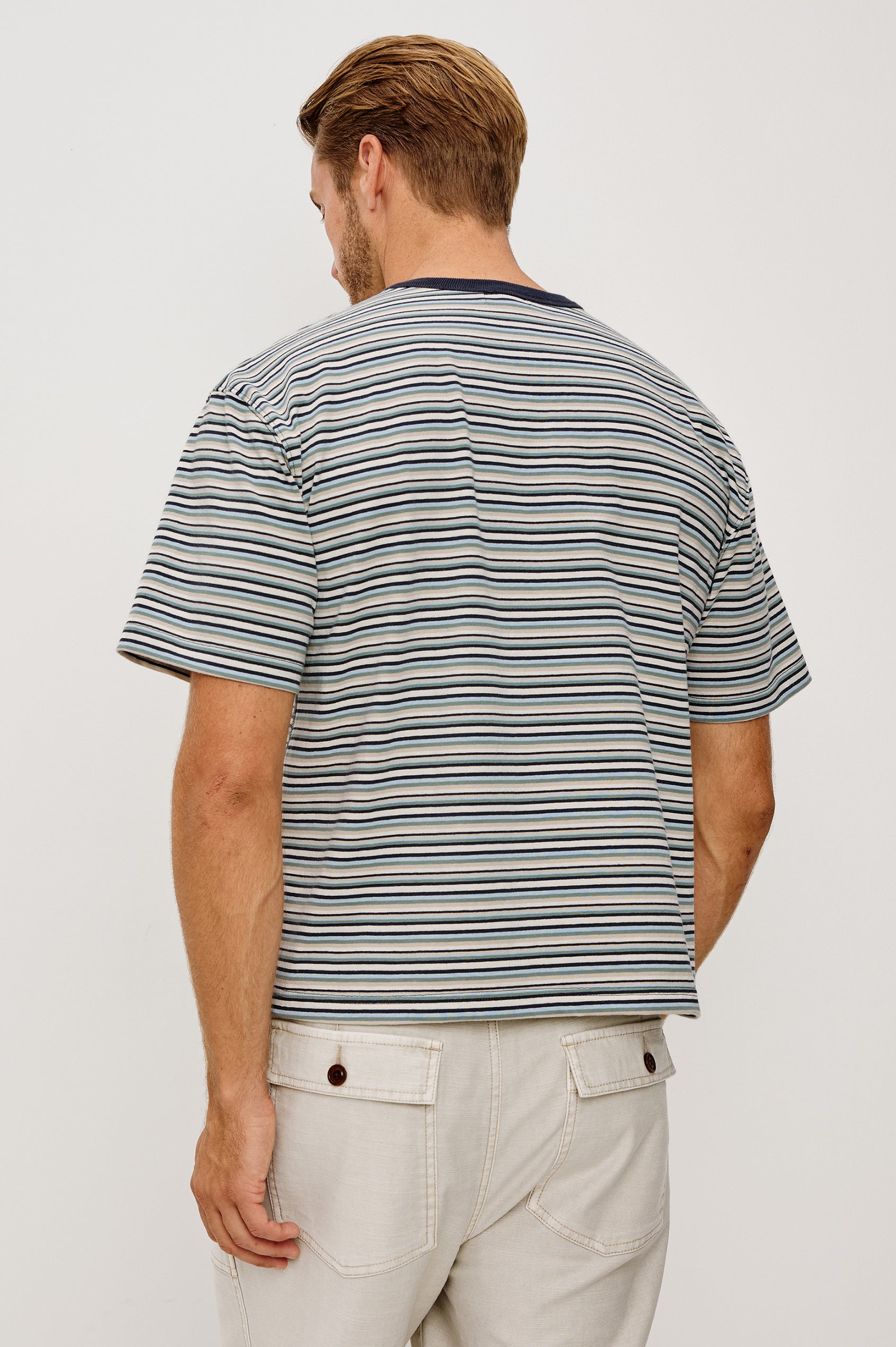 Kip T-Shirt in Relaxed Boxy Fit in Yarn-Dyed Jersey, Contrast Crew Neckline, and Short Sleeves in Azul Stripe Colorway - Upper Body Back View Featured on Model