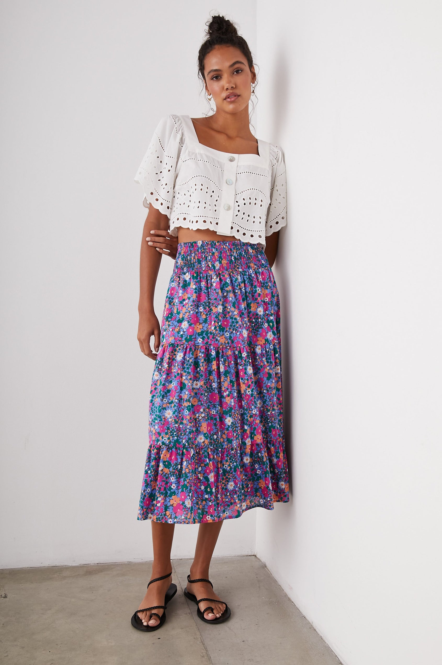 Kit Short Sleeve Crop Top with a Square Neckline, Front Button Closure, and an Eyelet Design in White Eyelet Embroidery Colorway - Front Full Body View Featured on Model 