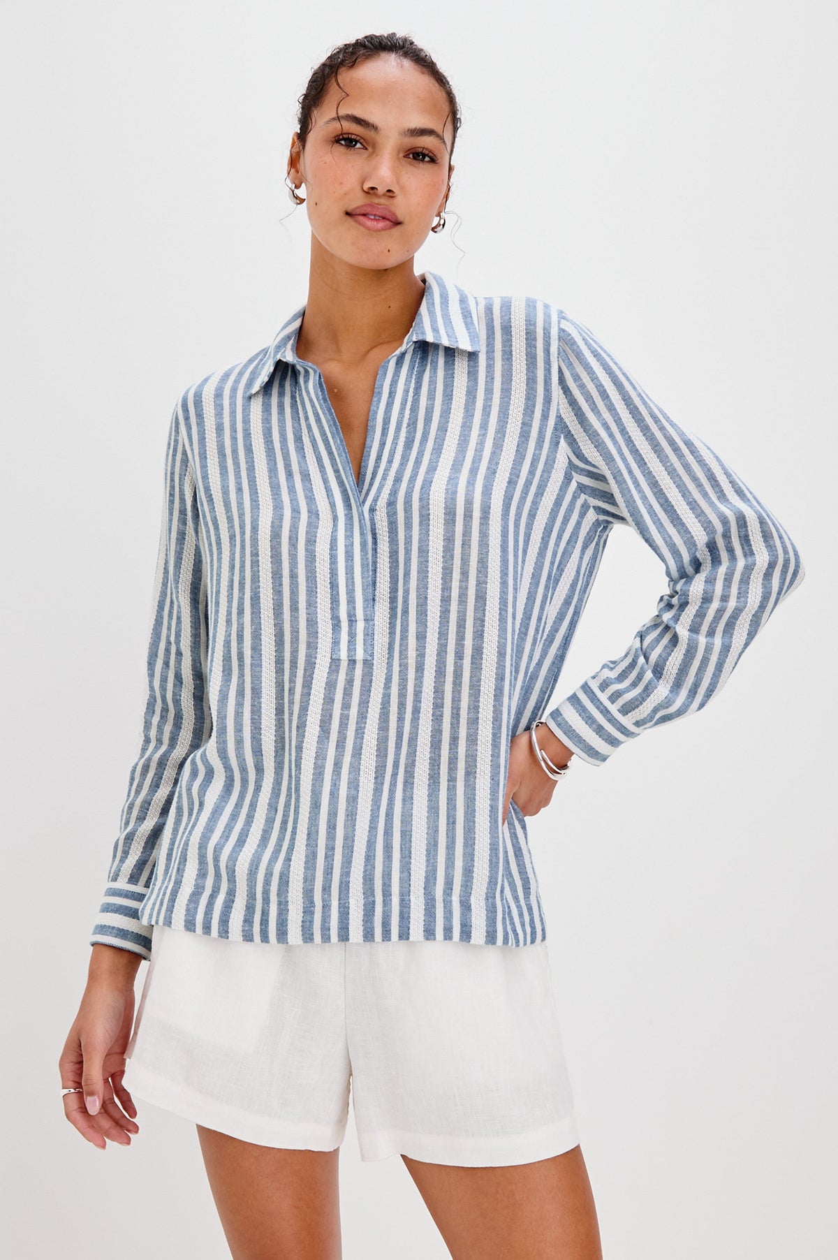 Lagoon Collared Shirt with Long Sleeves and a Hidden Half Button Front Placket in Jalisco Colorway. Front View Shown on Model.