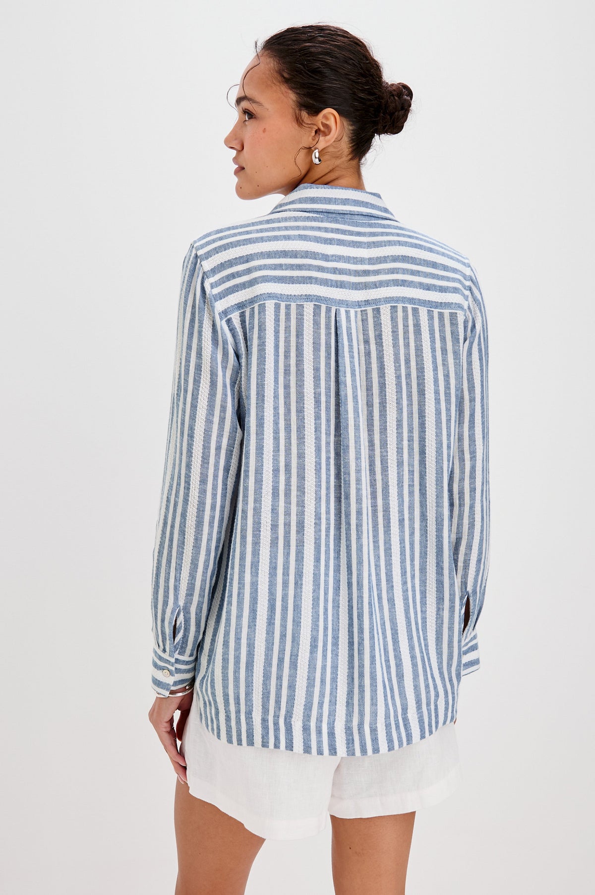 Lagoon Collared Shirt with Long Sleeves and a Hidden Half Button Front Placket in Jalisco Colorway. Back View Shown on Model.