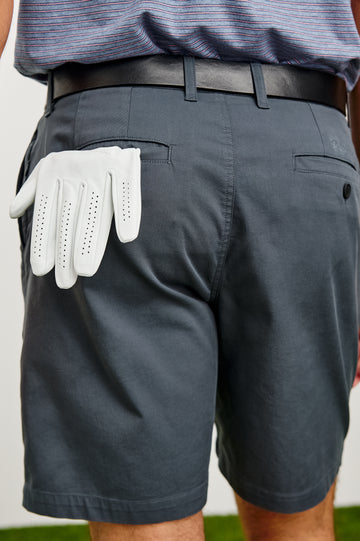 Laguna Mid-Length Short in Light Stretch Cotton With Belt Loops and Side Zip Pockets in Slate Grey Colorway - Lower Body Back View Featured on Model