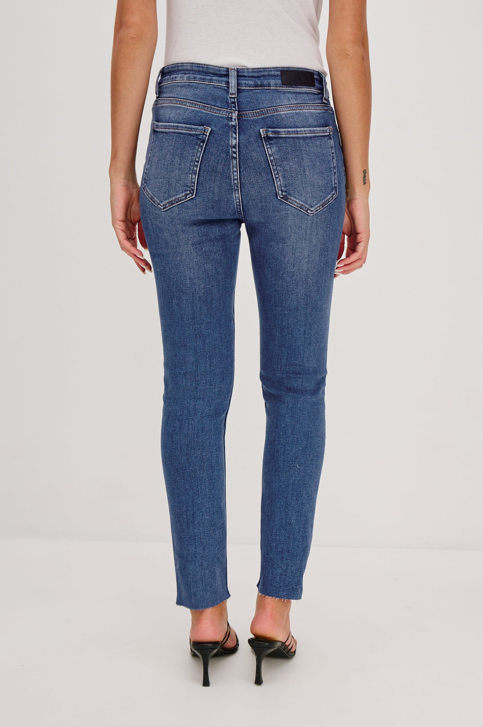 Larchmont 5-pocket skinny jean in medium-light wash tidepool. Back View Shown on Model.