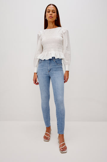 Larchmont 5-pocket skinny jean in medium-light wash tidepool. Full Body Front View Shown on Model.