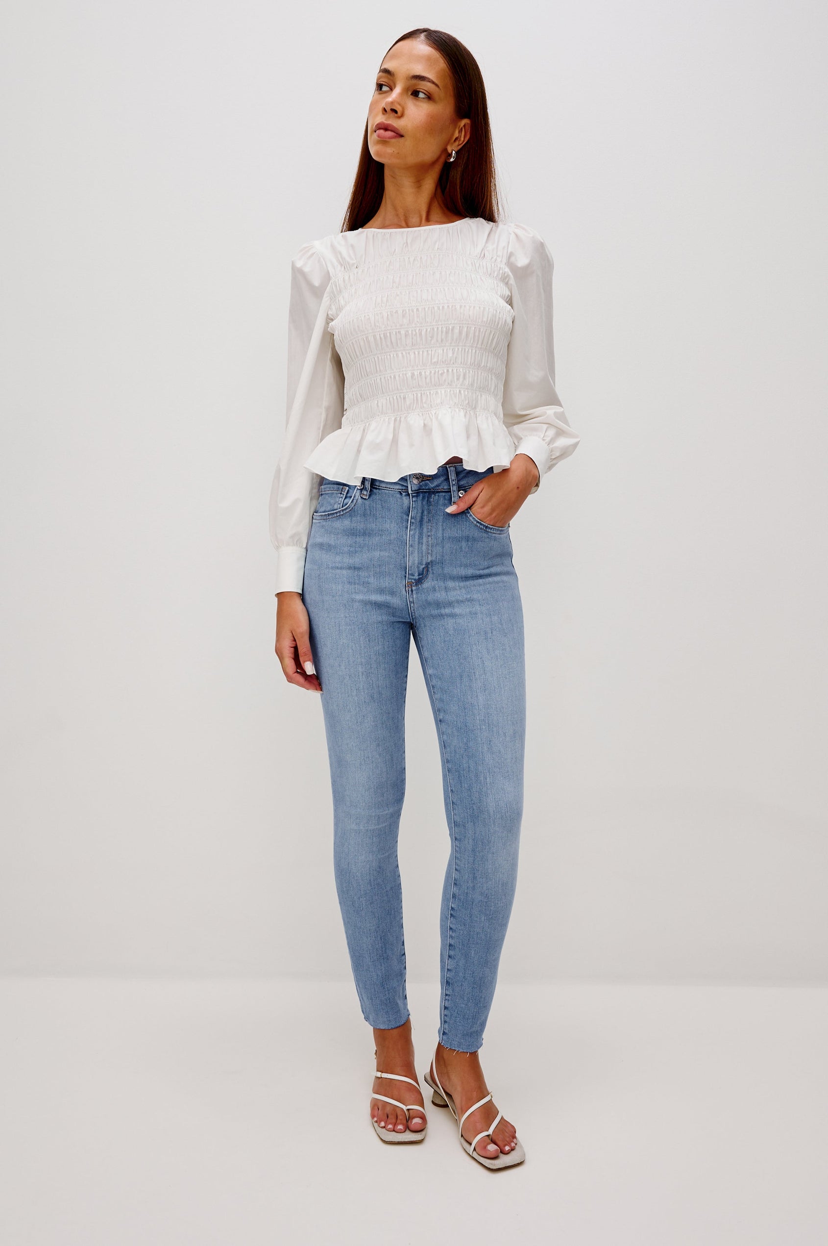 Larchmont 5-pocket skinny jean in medium-light wash tidepool. Full Body Front View Shown on Model.