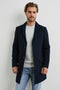 Lark Thigh-Length Coat with Two Button Closure, Notched Lapels, and Two Front Flap Pockets in Navy Colorway - Front View Featured on Model