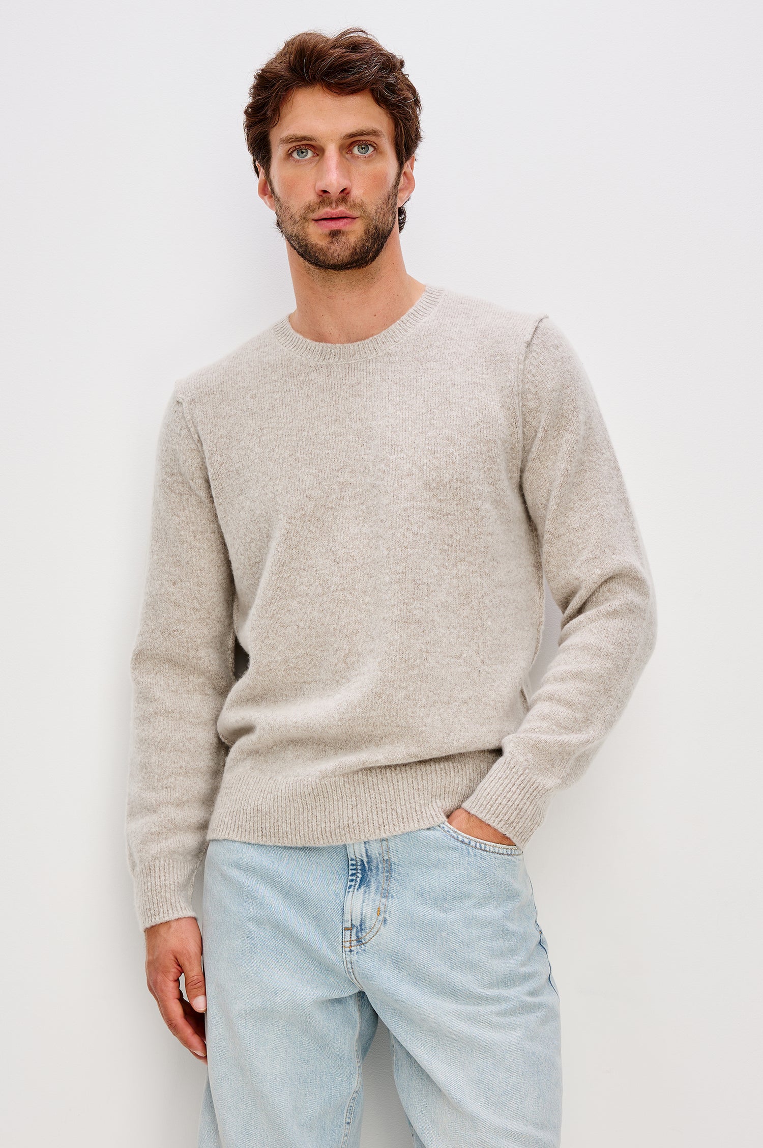 Laurent Crewneck Sweater in Wool Blend With Dropped Shoulders With Linking Stitch Detailing and Long Sleeves in Silverleaf Colorway - Upper Body Front View Featured on Model