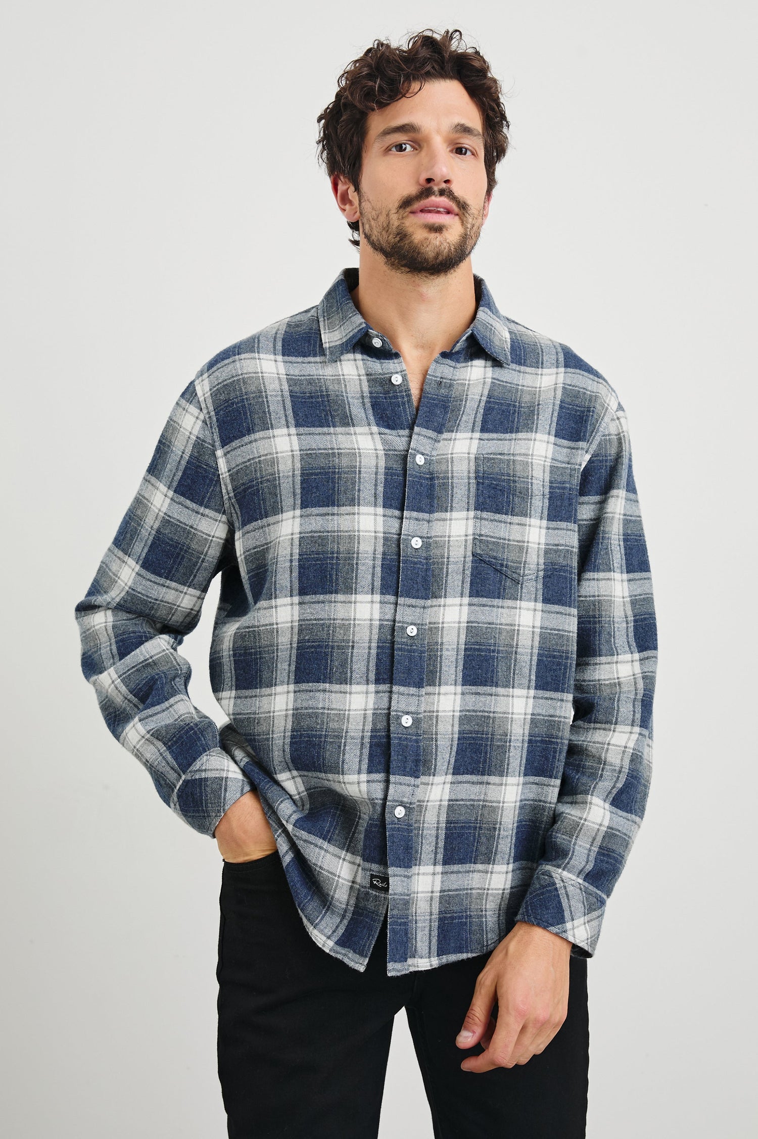 Lennox Long-Sleeve Button Up with a Chest Patch Pocket in Charcoal Lapis Colorway, a plaid in Charcoal, Lapis and White - Front View Featured on model
