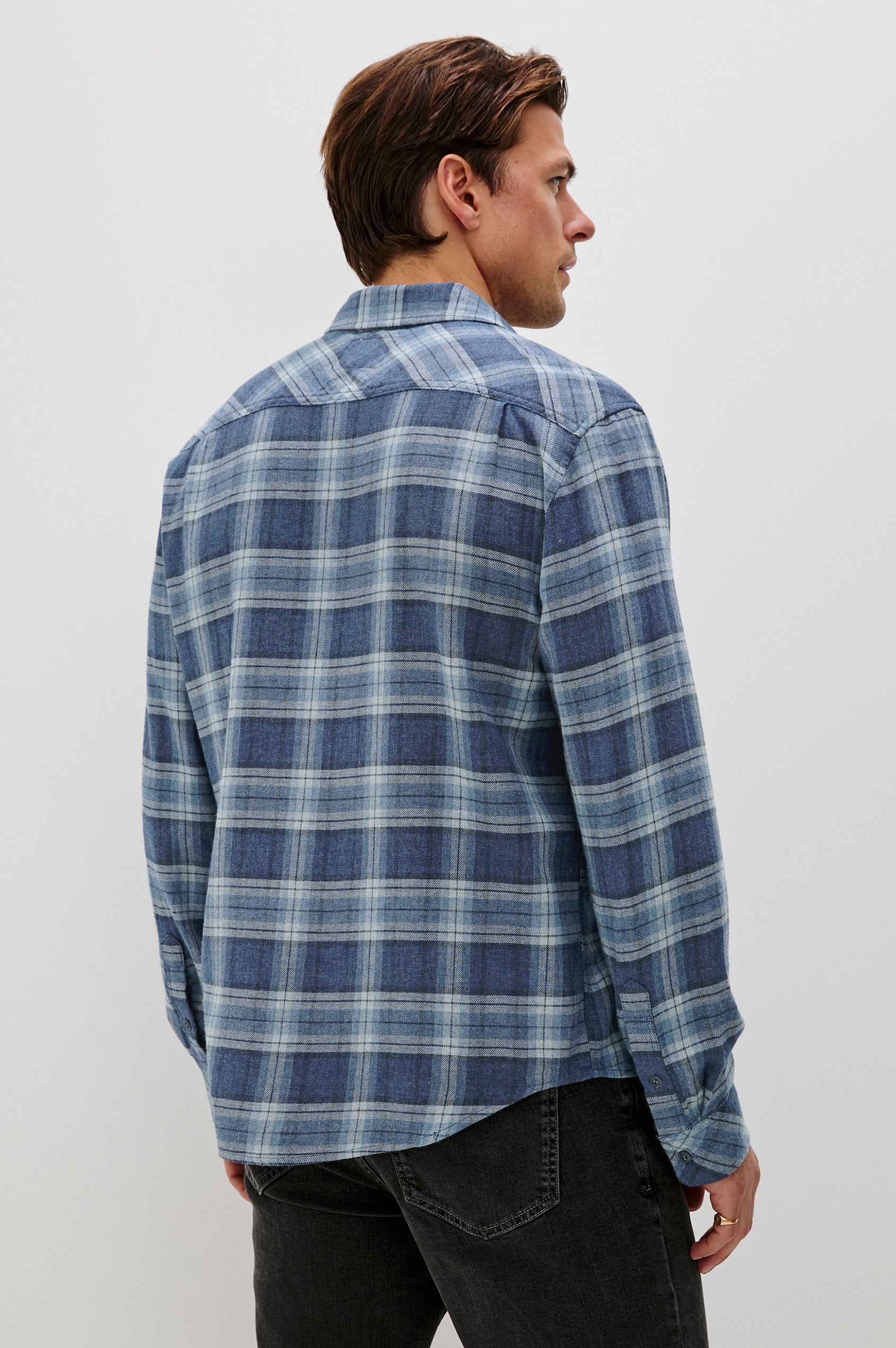 Lennox Long-Sleeve Button Up with a Chest Patch Pocket in Inkwell Melange Colorway, a plaid wtih dark and light blues - Back View Featured on model