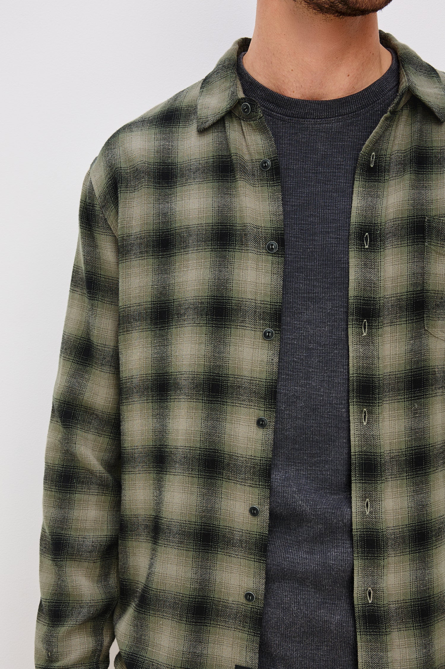 Lennox Button Front Plaid Shirt in Brushed Cotton Blend With Collar and Long Sleeves in Licen Onyx Colorway - Upper Body Front Close Up View Featured on Model