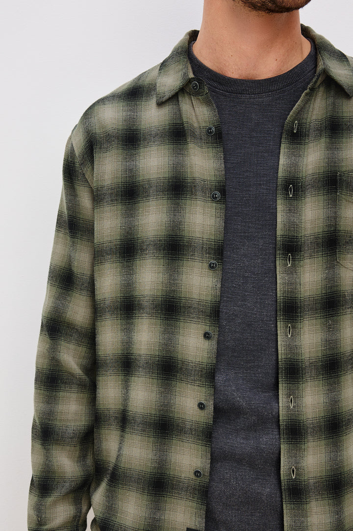 Lennox Long-Sleeve Button Up with a Chest Patch Pocket in Lichen Onyx Colorway - Front Detail View Featured on model