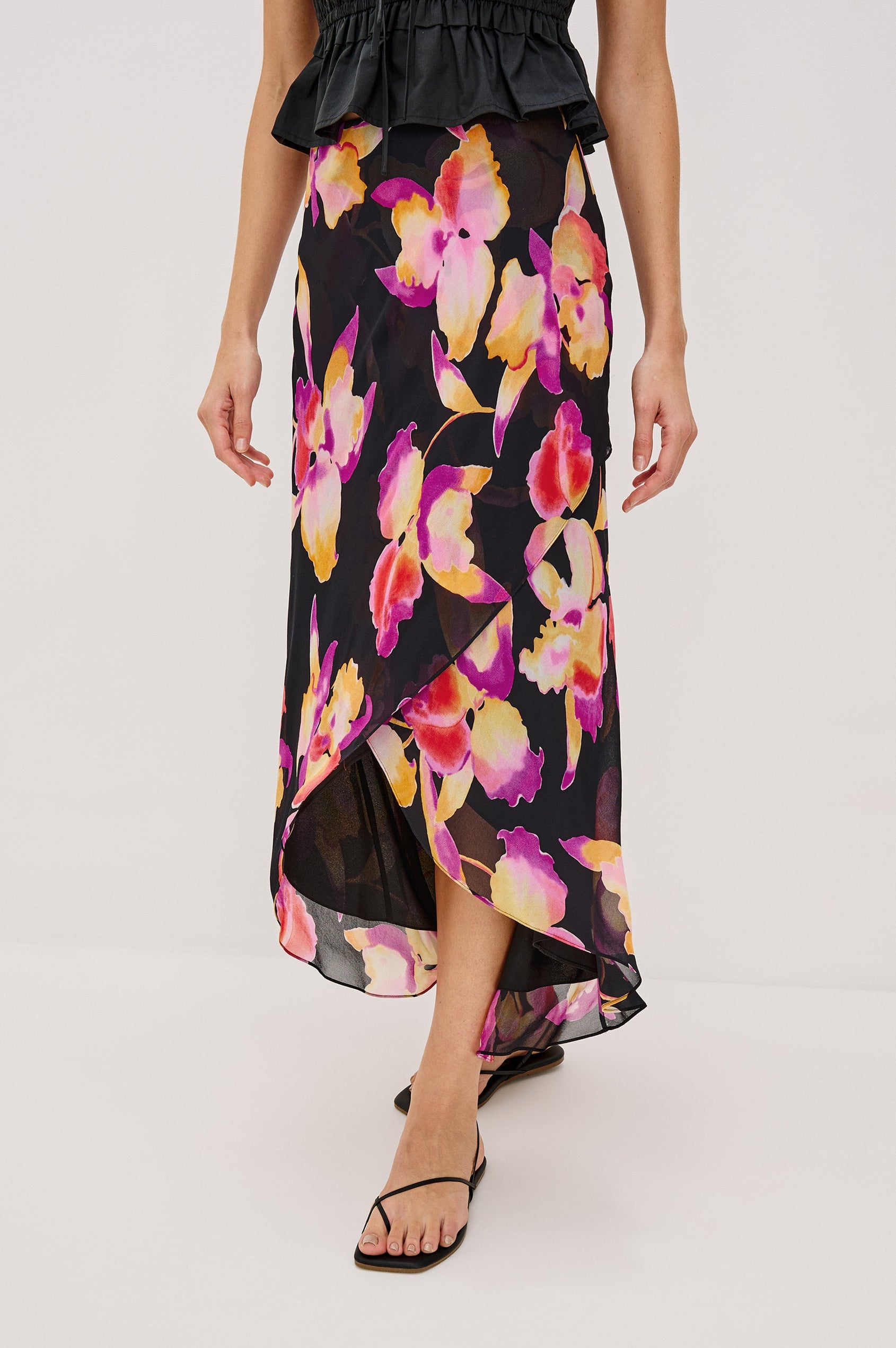 Lenora Cross Front Skirt, High-Low Midi Length, Hidden Elastic Waistband, Lined, in Dusk Orchid Colorway. Side View Shown on Model. 