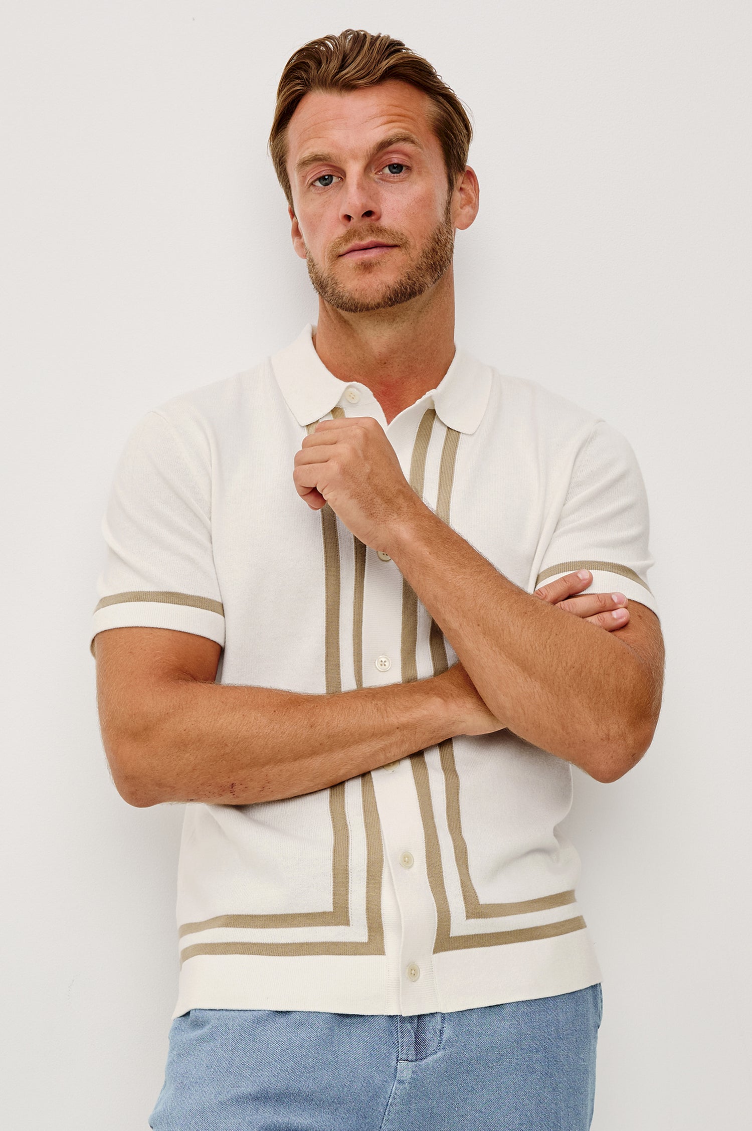 Leo Knit Sweater Polo in Yarn-Dyed Cotton Blend With Collar, Front Buttons, and Short Sleeves in White Cashew Colorway - Upper Body Front View Featured on Model