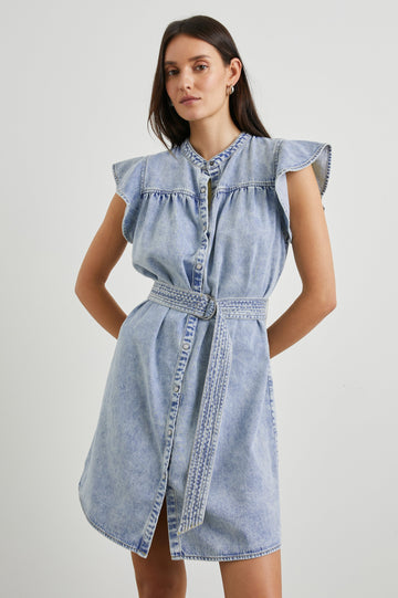 Letta Above-Knee Dress with Flutter Sleeves, Snaps down the Front, and a Belted Waist in Faded Indigo Colorway - Front View Featured on Model 