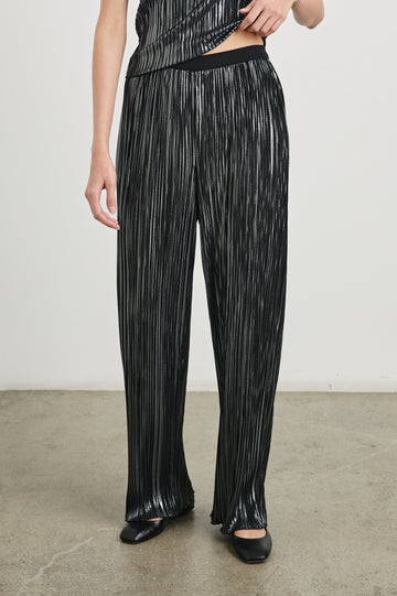 Liana Micro-Pleated Pants with an Elastic Waist in Gunmetal Colorway, Thin black, white and grey Vertical Stripes - Front View Featured on Model 