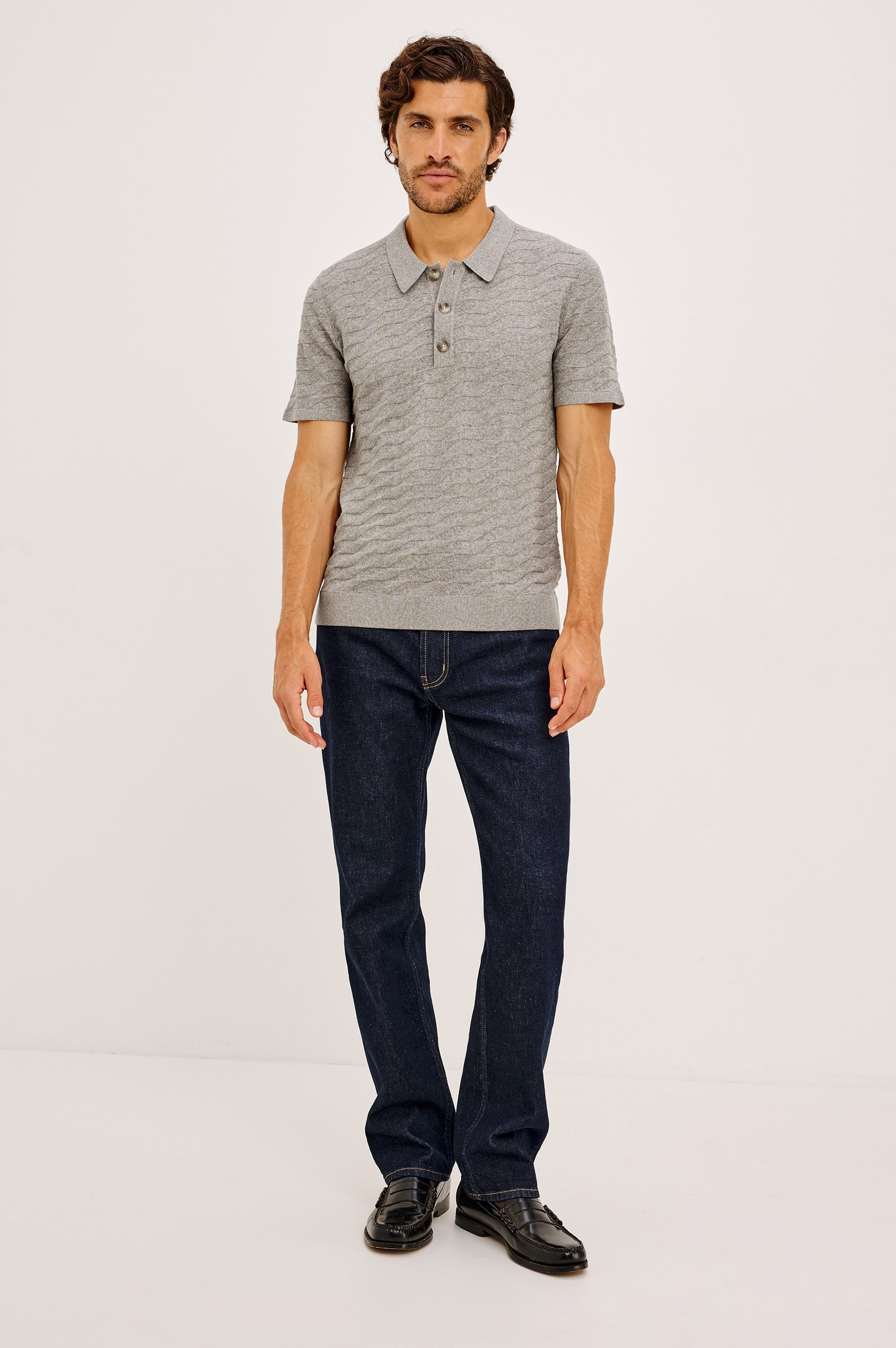 Linden Polo Shirt in Cotton Knit With Subtle Diamond Texture, Classic Fit, Quarter Button Placket, Short Sleeves, and Ribbed Trim in Heather Grey Prism Colorway - Full Body Front View Featured on Model