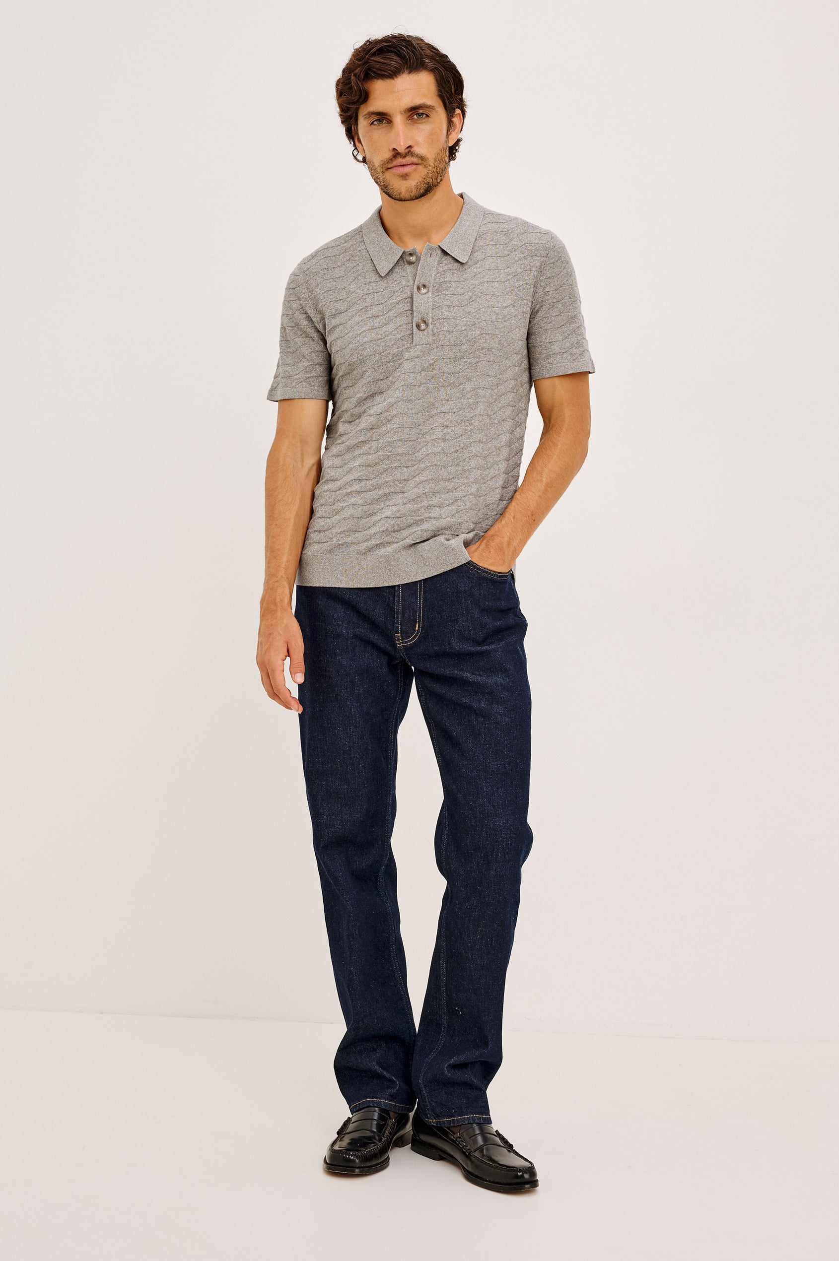 Linden Polo Shirt in Cotton Knit With Subtle Diamond Texture, Classic Fit, Quarter Button Placket, Short Sleeves, and Ribbed Trim in Heather Grey Prism Colorway - Full Body Front View Featured on Model