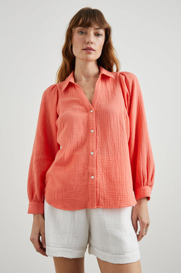Lo Long-Sleeve Button Up with a V Neck in Papaya Colorway - Front View Featured on Model