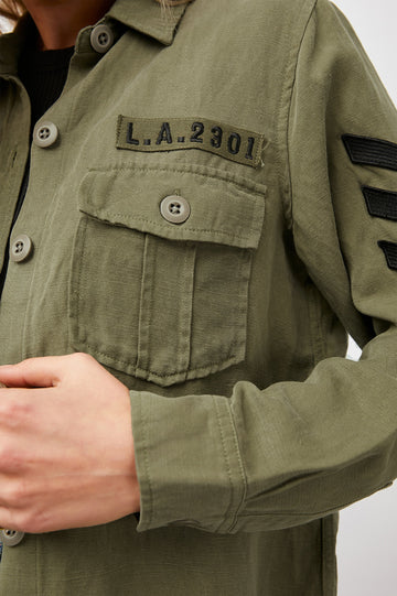 LOREN-OLIVE-BLACK-MILITARY-SATIN-PATCHES-DETAIL