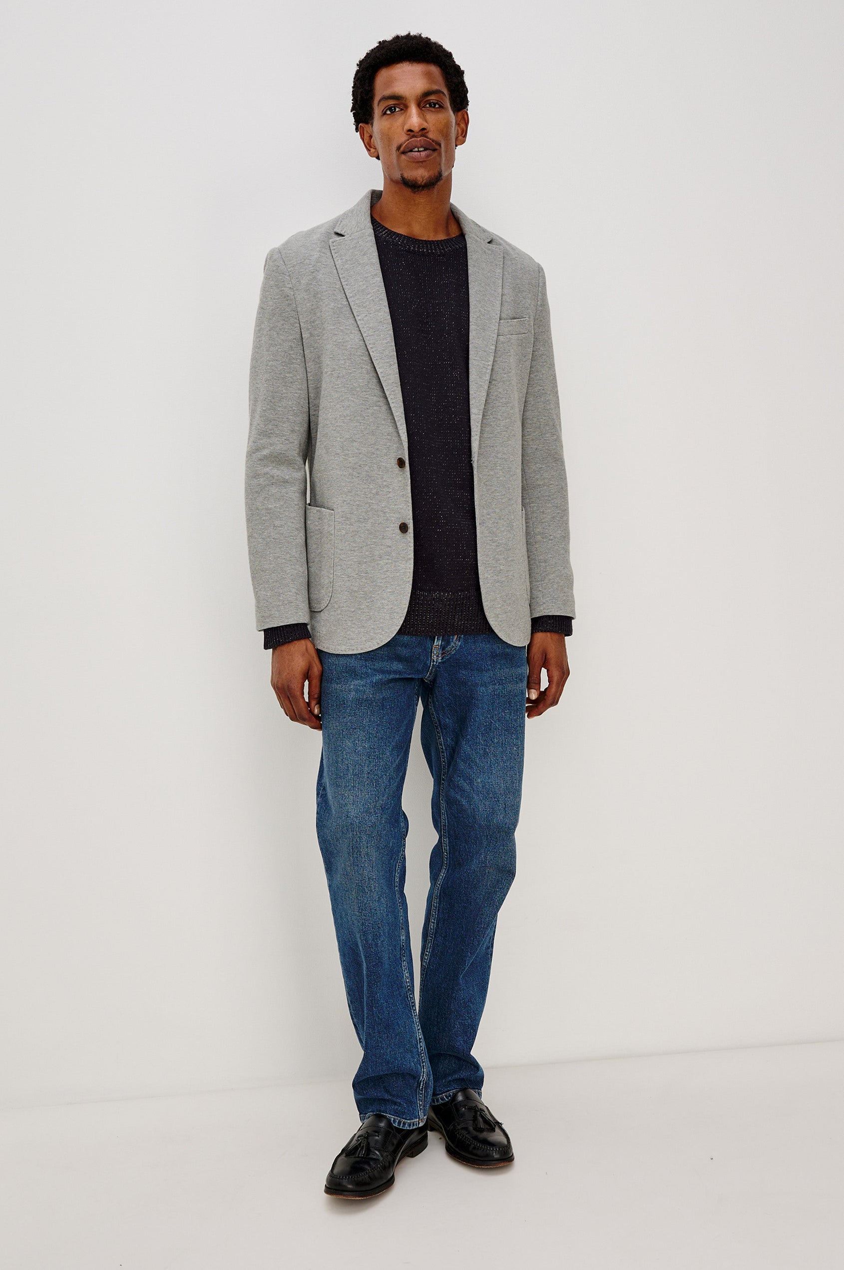 Lorenz Single Breasted Blazer with two patch pockets and one chest pocket in Heather Grey Colorway. Front Full Body View Shown on Model.