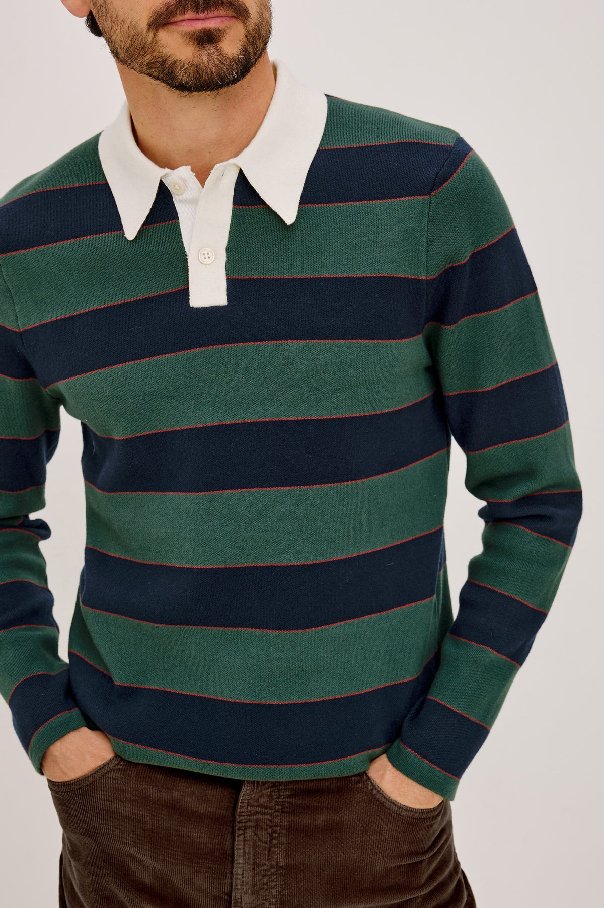 Luther Sweater in Striped Knit With Contrast Collar, Quarter-Button Placket, and Long Sleeves in Tartan Border Stripe Colorway - Upper Body Front Detail View Featured on Model.