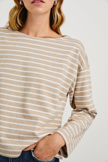 Macy Long-Sleeved Top with Boatneck and Two Short Side Slits at the Hem in Heather Beige Stripe Colorway, Horizontal Stripes - Front View Featured on Model