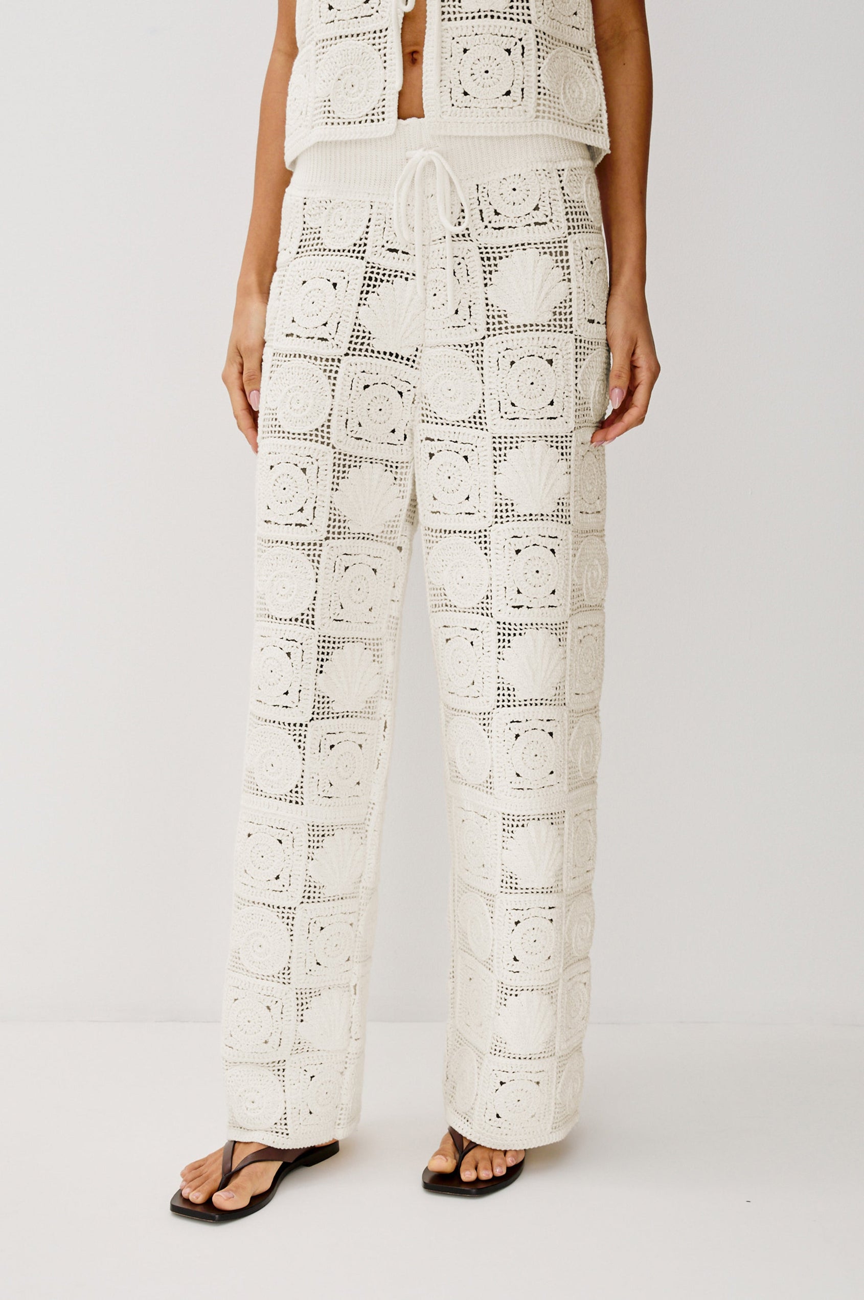 Maja Straight Leg Pant with Ribbed Drawstring Waistband in White Sea Shell Crochet Colorway. Front View Shown on Model.