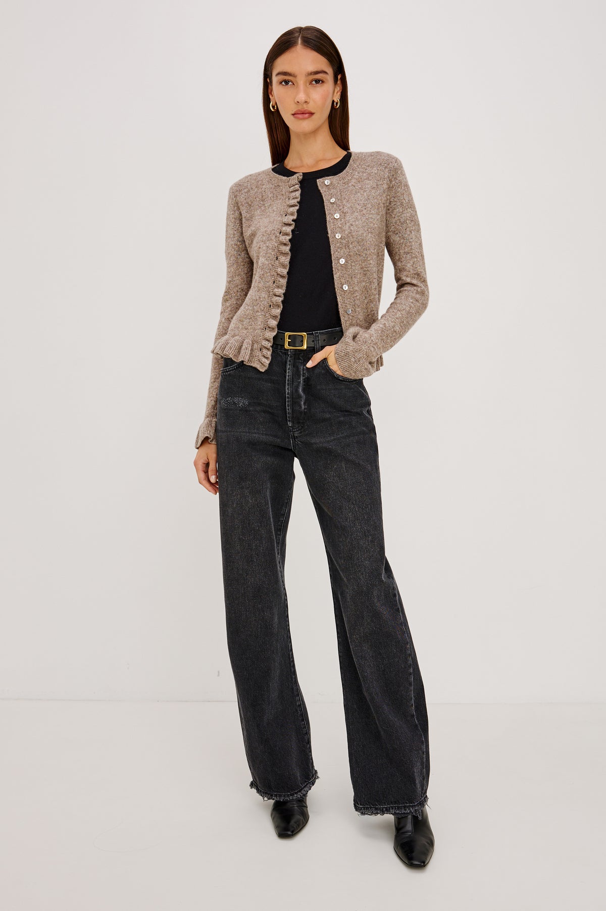 Mandy Sweater in Cashmere-Cotton-Wool Blend Knit Front Buttons, Long Sleeves, Classic Slightly Cropped Fit, and Ribbed Ruffle Trim in Heather Latte Colorway - Full Body Front View Featured on Model.