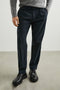 Marcellus Pants with Belt Loops, Two Seam Front Pockets, a Front Buttoned Flap Pocket, a Back Buttoned Welt Pocket and a Back Welt Pocket in Dark Navy Colorway - Front View Featured on Model 