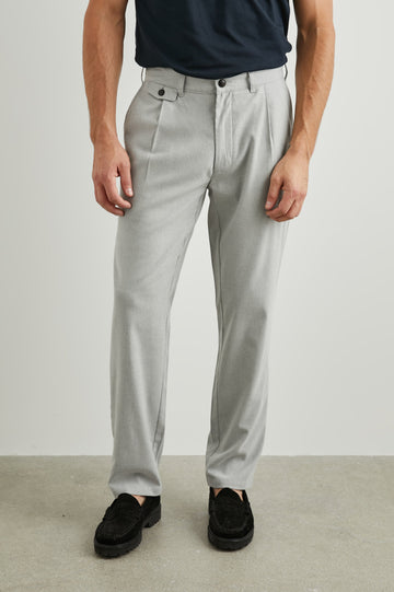 Marcellus Pants with Belt Loops, Two Seam Front Pockets, a Front Buttoned Flap Pocket, a Back Buttoned Welt Pocket and a Back Welt Pocket in Soft Grey Melange Colorway - Front View Featured on Model 