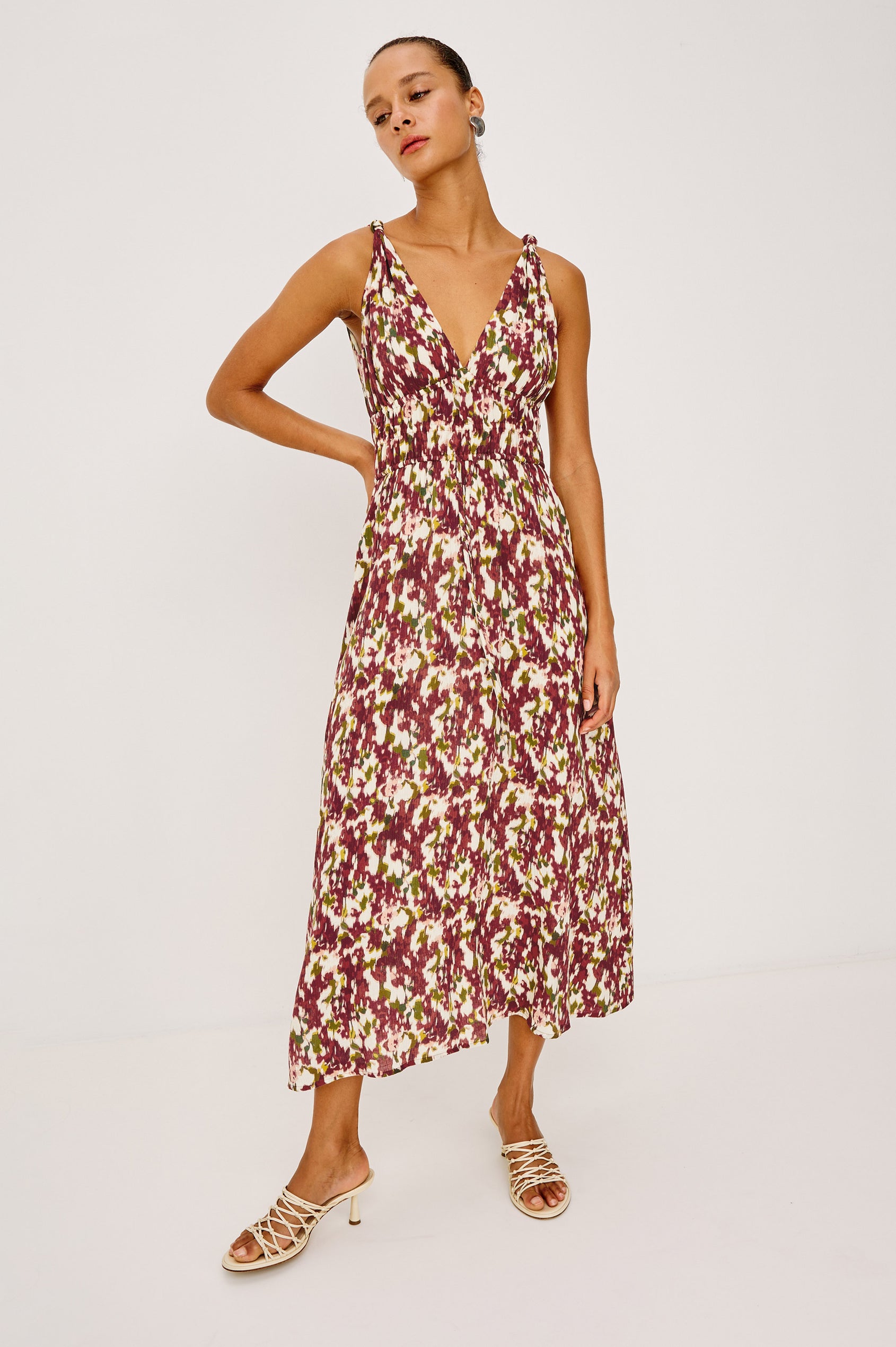 Marciana Midi Dress in Crinkle Chiffon With V-Neckline, Knotted Shoulder Straps, Smocked Waist, Adjustable Empire Waist Ties, and is Fully Lined in Cardinal Floral Colorway - Full Body Front View Featured on Model