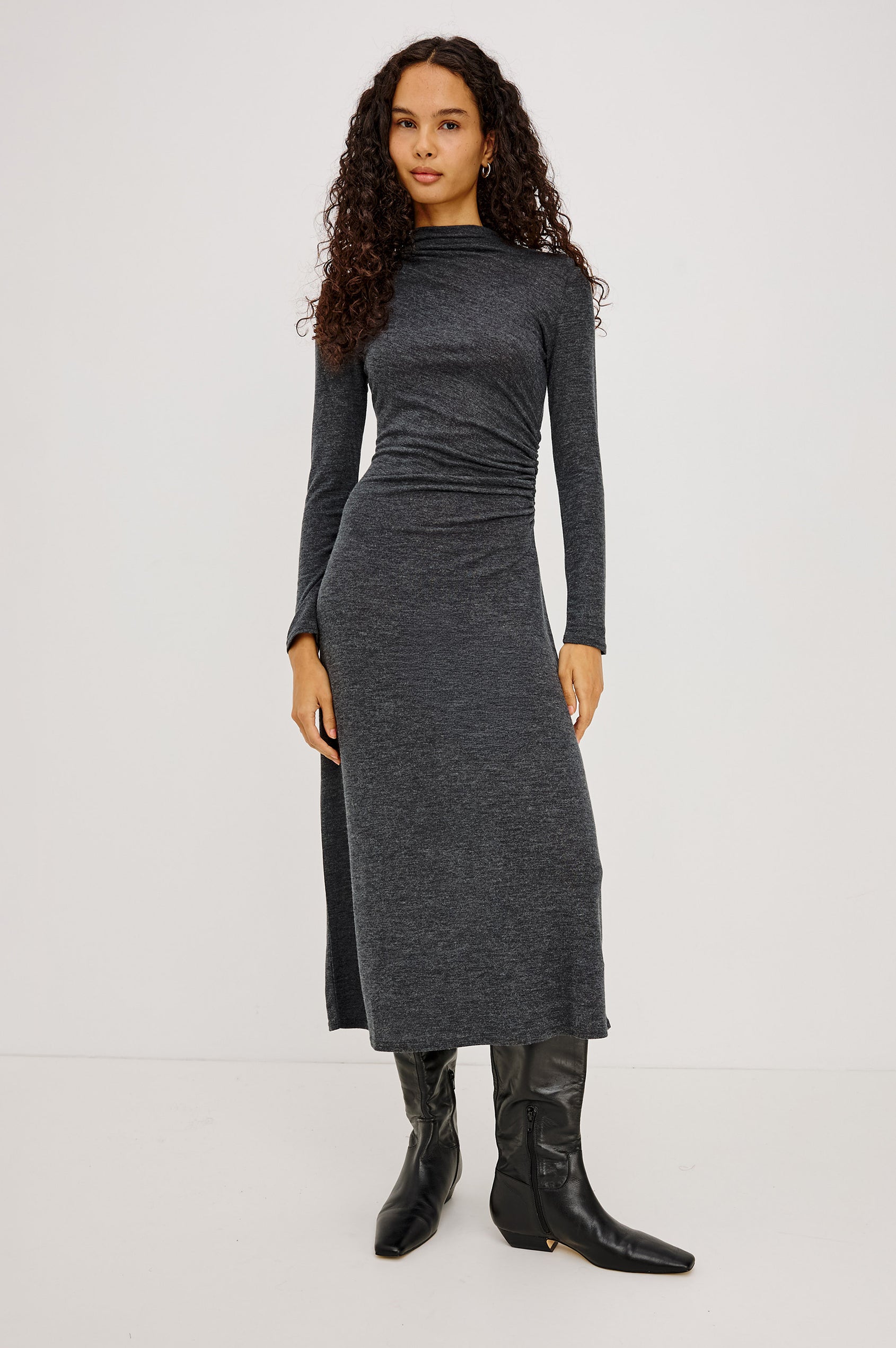 Margaret Midi Dress in Brushed Tissue Jersey With Mock Neck, Long Sleeves, Ruched Sides, and Fitted Silhouette in Charcoal Colorway - Full Body Front View Featured on Model