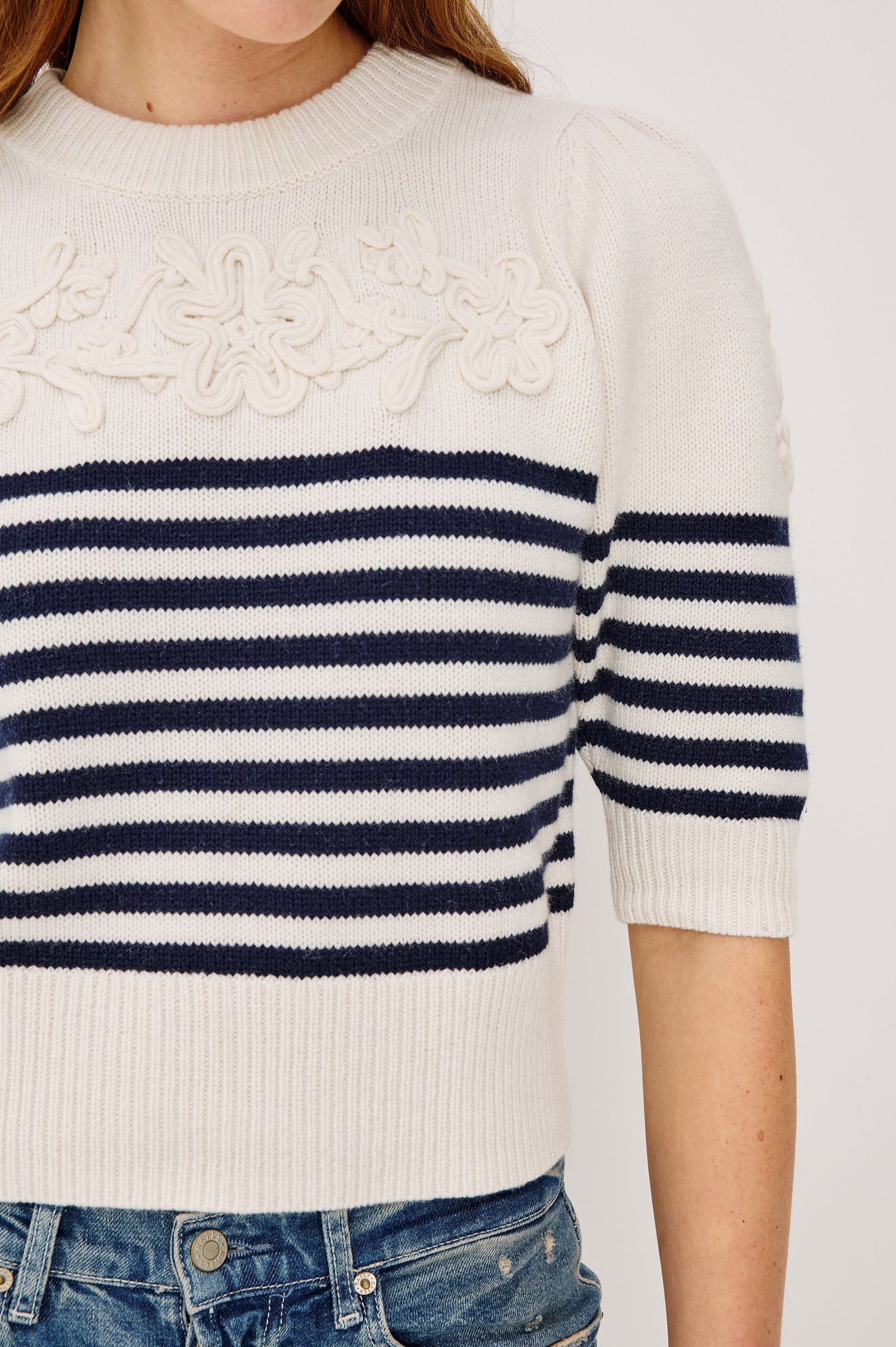 Martha Top in Wool Blend With Crew Neckline, Soutached Floral Detailing, Elbow-Length Puff Sleeves, and Ribbed Trim in Navy Floral Stripe Colorway - Upper Body Close Up View Featured on Model
